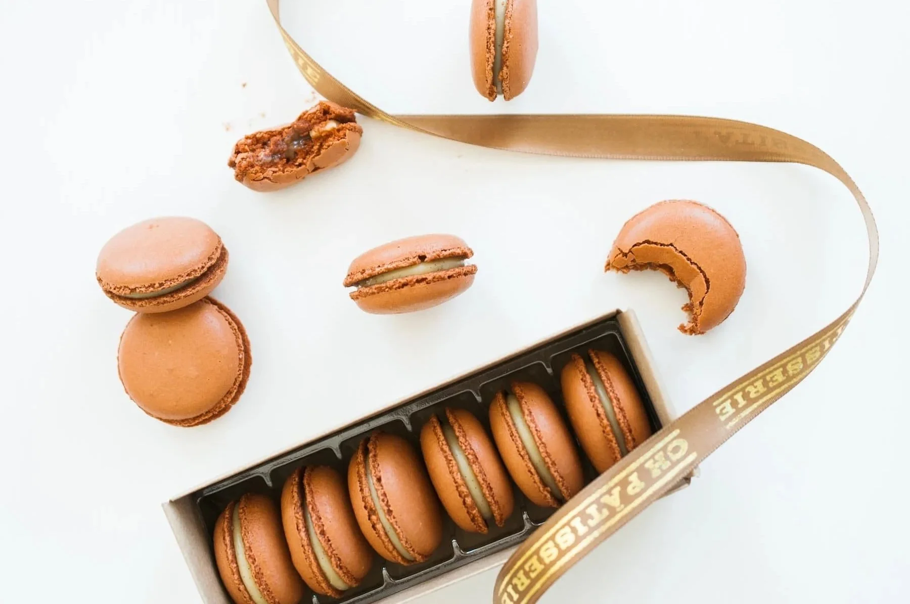 Chocolate macaron photography from CH Patisserie.