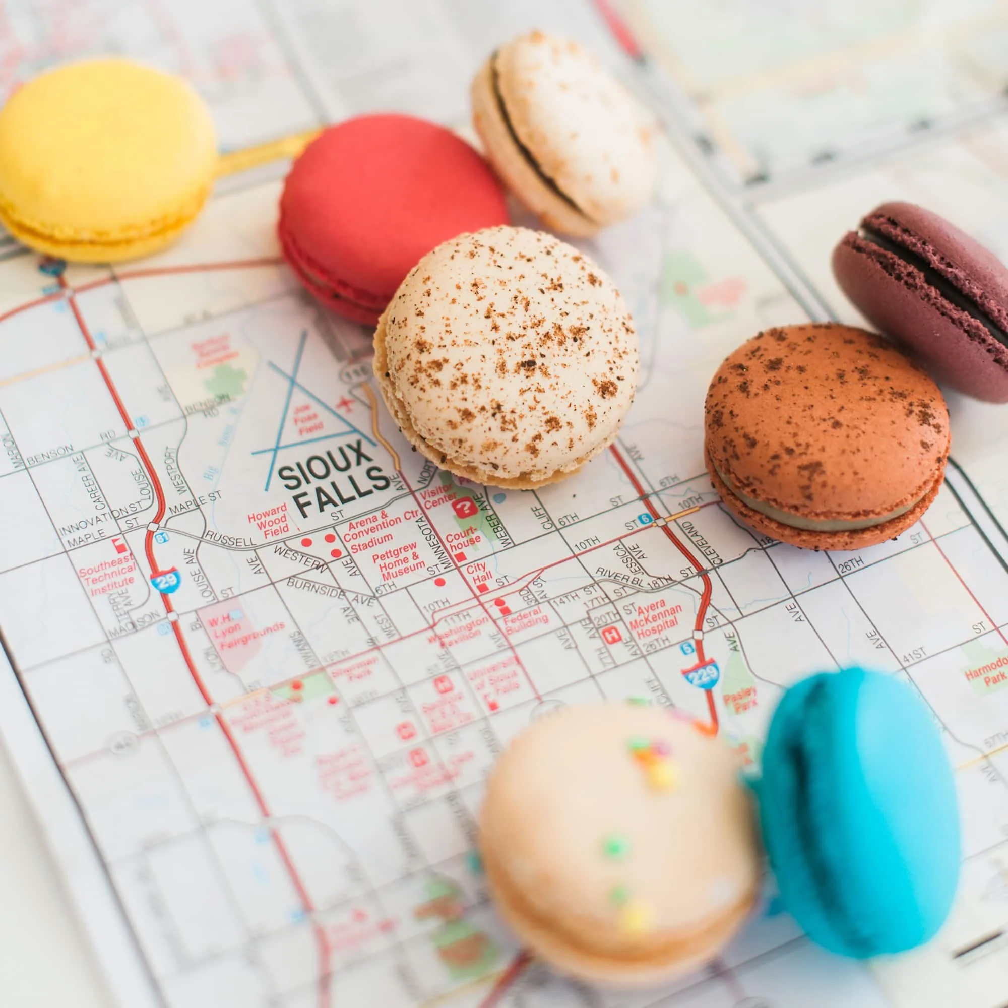 Close up of Sioux Falls, SD map and multi color macarons.