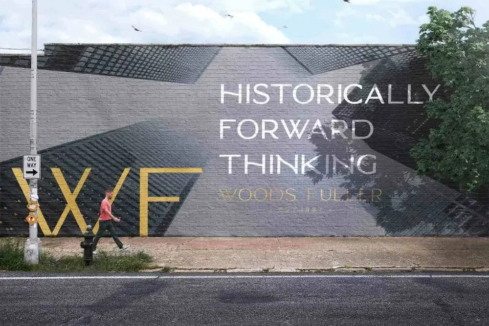 Woods Fuller Brand Mural on a brick wall