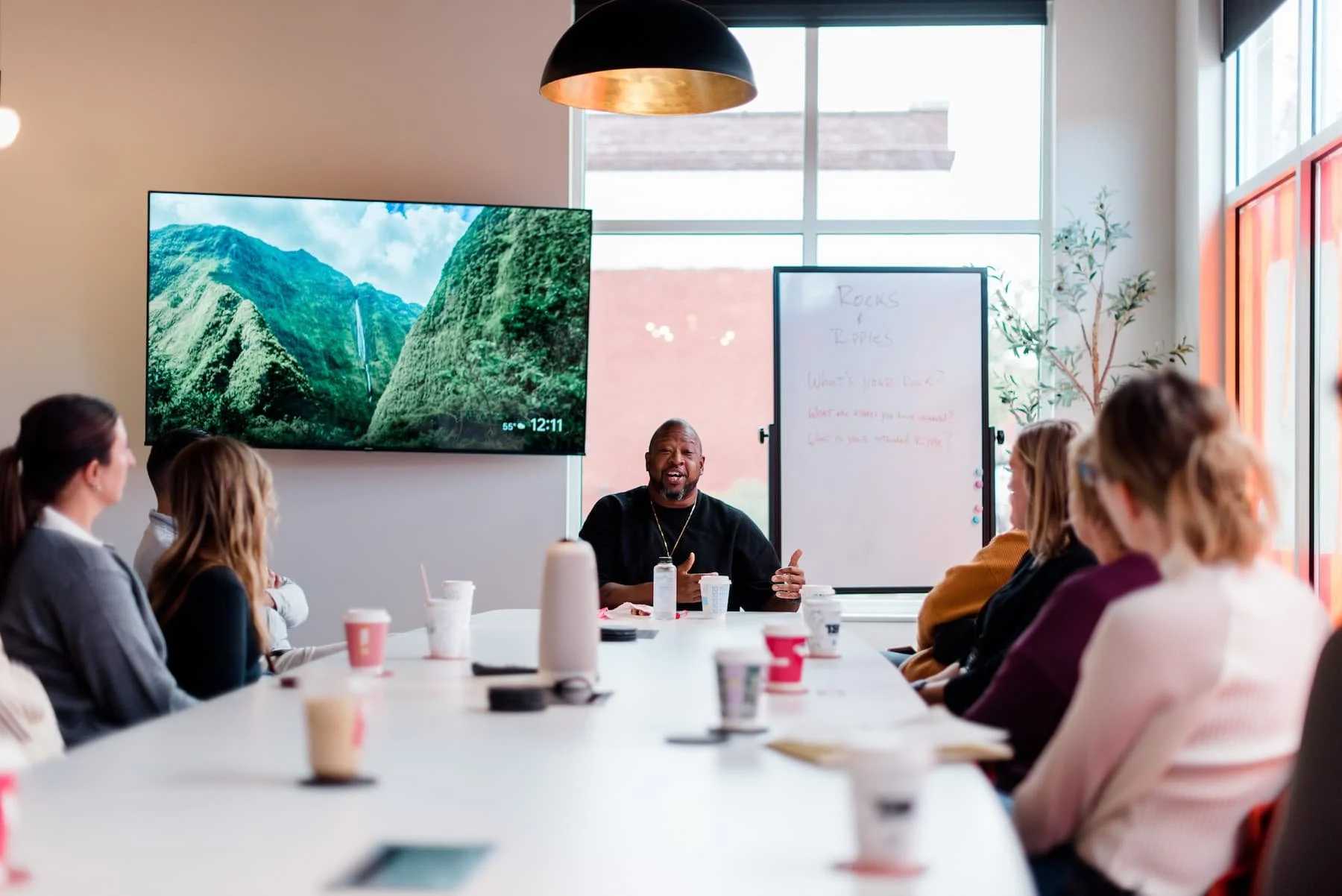 Vaney Hariri talking to group of people.