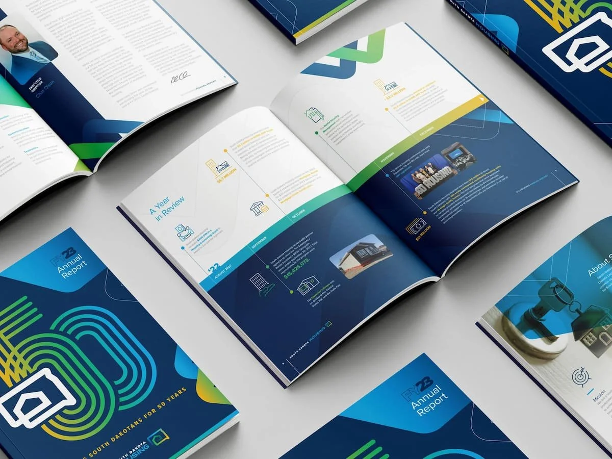Internal pages of SD Housing 2023 Annual Report Designed by The Sampson House. Gold Addy Winner.