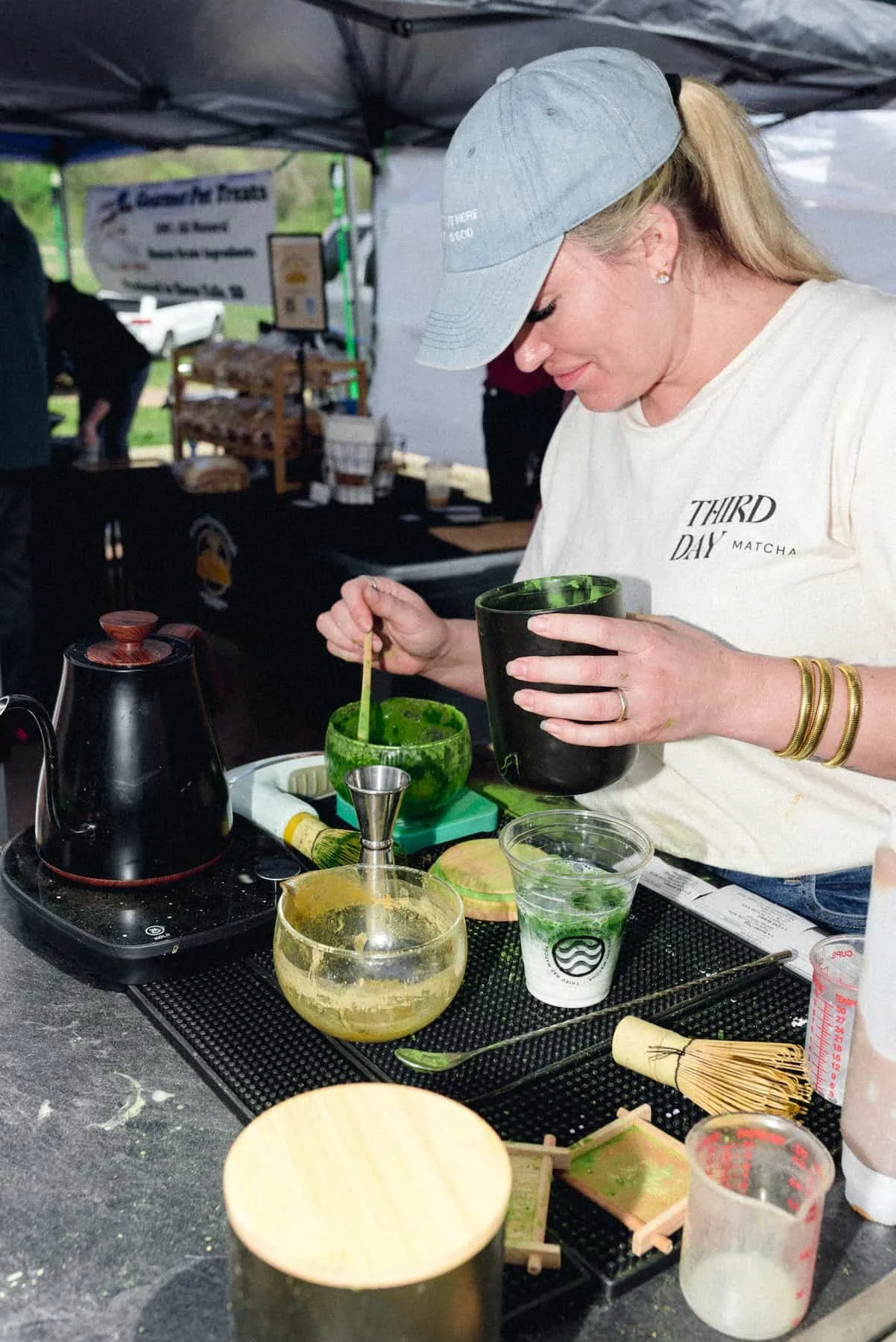 Woman making matcha.