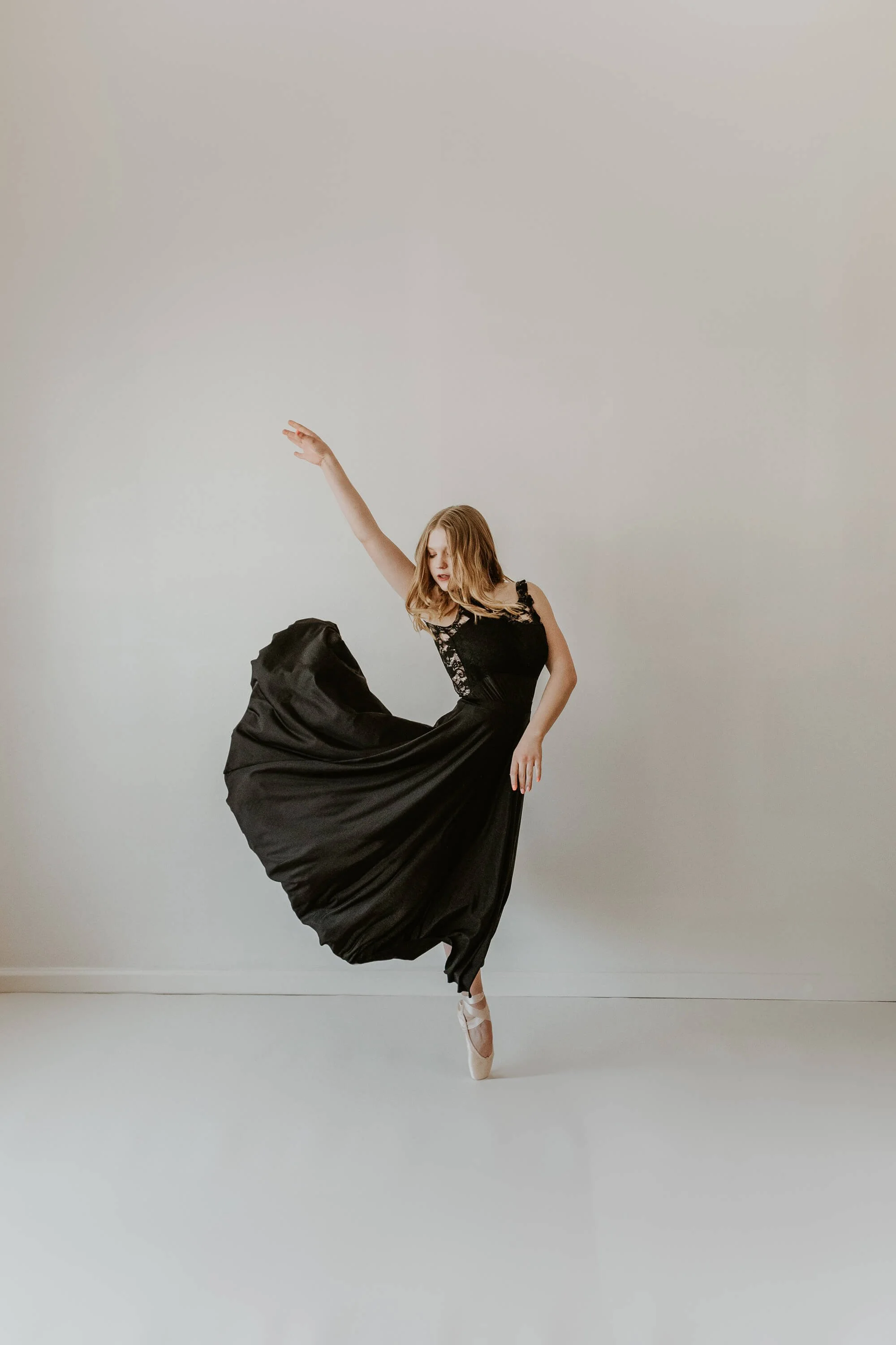 Katy, a talented senior at Bloomington High School, holds an effortless pose en pointe.