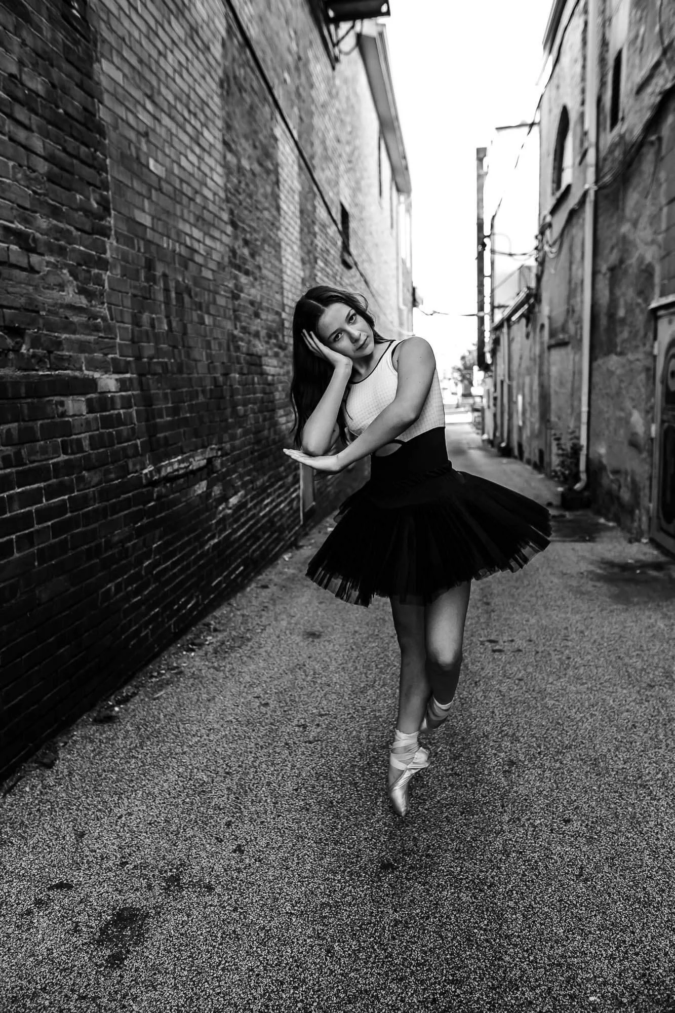 A black and white image of Katy, a dancer at University High School in Normal IL.