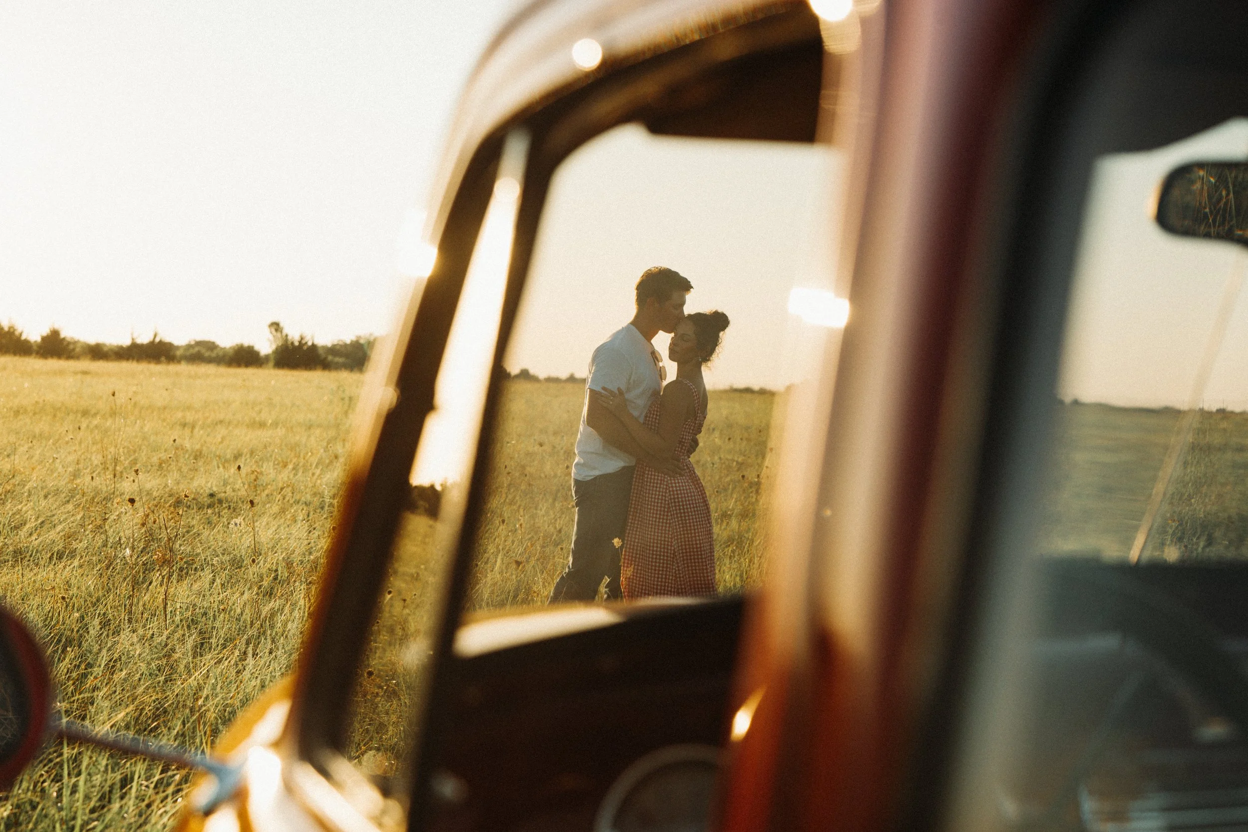 Summer country engagement photos with antique truck.