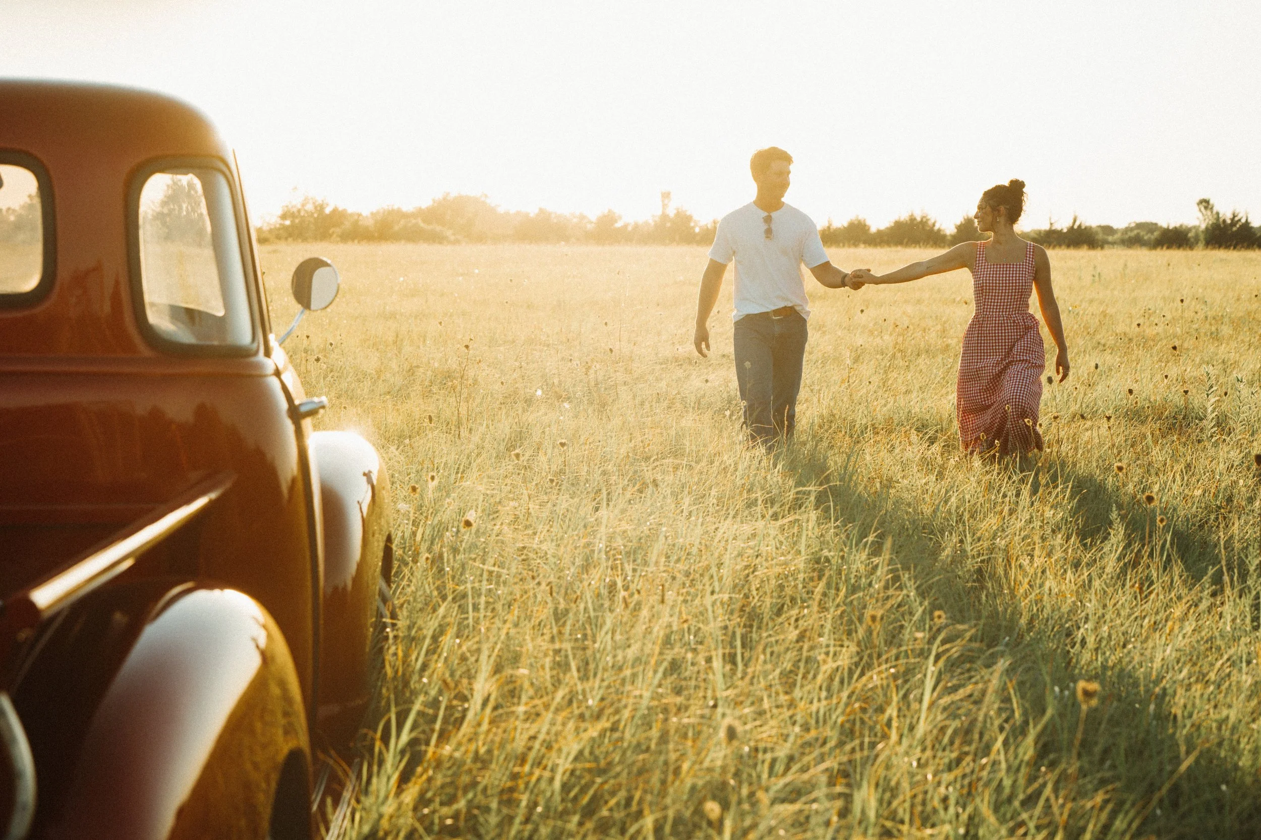 Summer country engagement photos with antique truck.