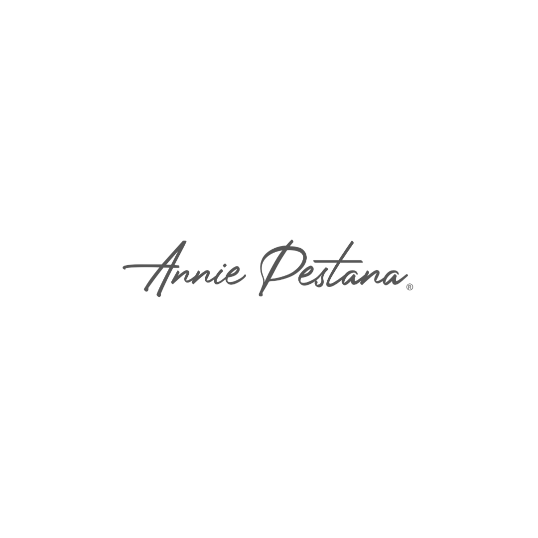 Logotipo com a assinatura de Annie Pestana.