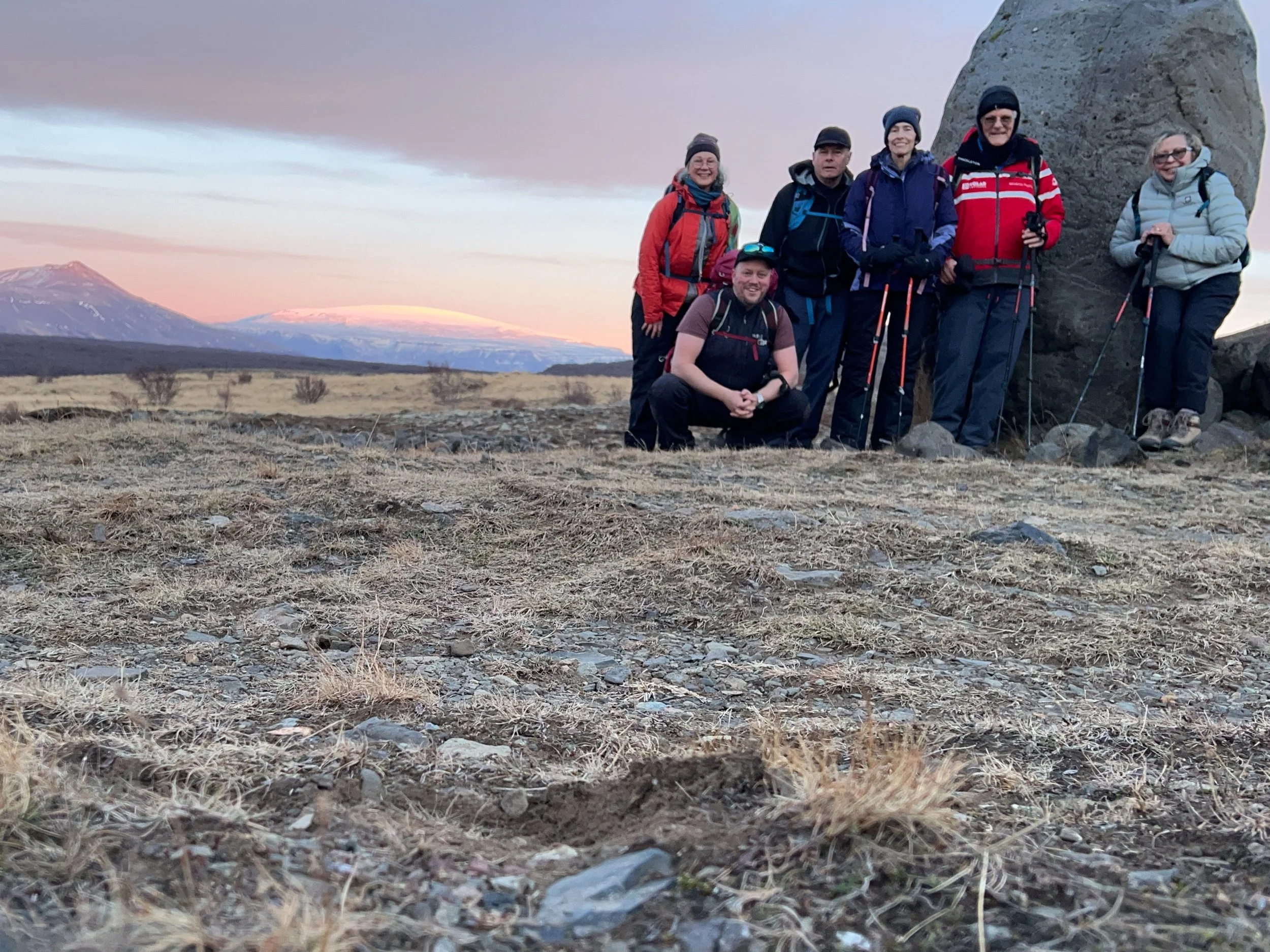 Our group after the Baejargil hike. Can you guess which one of us is Icelandic? Eiriksjökull is in the distance, rosy-hued by the sunset. 