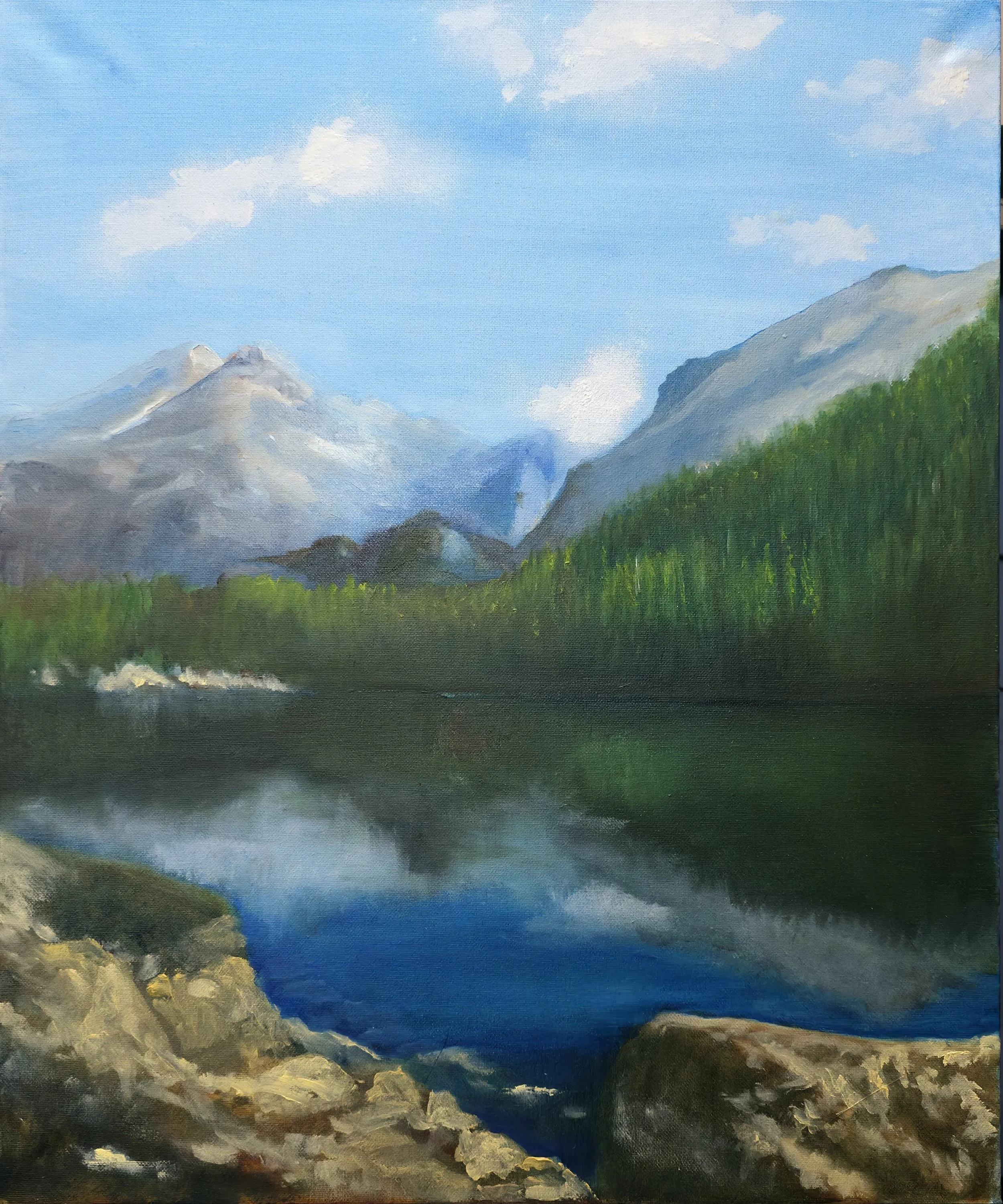 Painting of a lake in the mountains