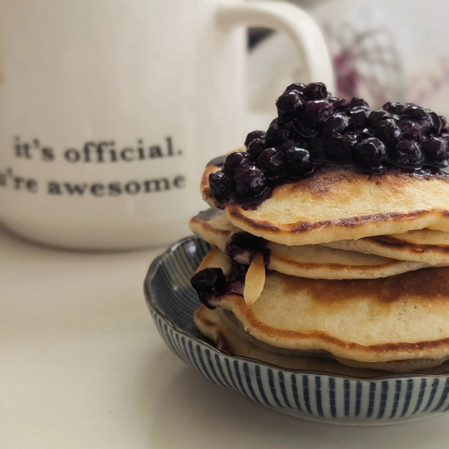 Good morning world! Starting the day with mini pancakes on a mini plate with mini blueberries 🫐