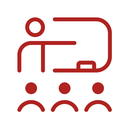 Icon of a person standing in front of a whiteboard or screen, with three people seated in front of them, indicating a classroom or training session.