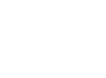 Close-up of white cursive text on a black background.