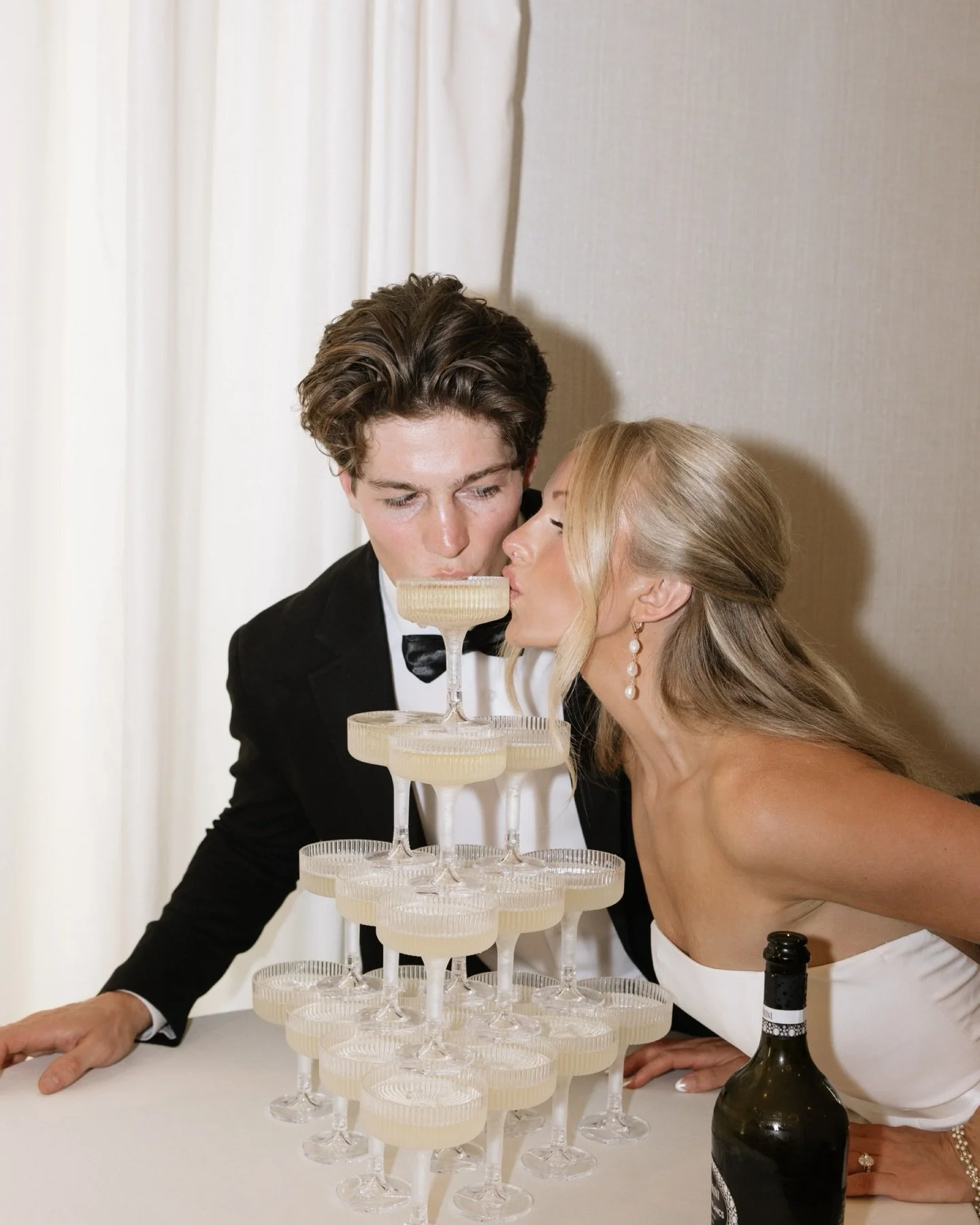 A champagne tower is ALWAYS a good idea at the reception 🥂🪩💃🏼

Taken while second shooting for @livbygrace 

#2026wedding #fargoweddingphotographer #thepines #northdakotaweddingphotographer #ndweddingphotographer #northdakotawedding #ndwedding