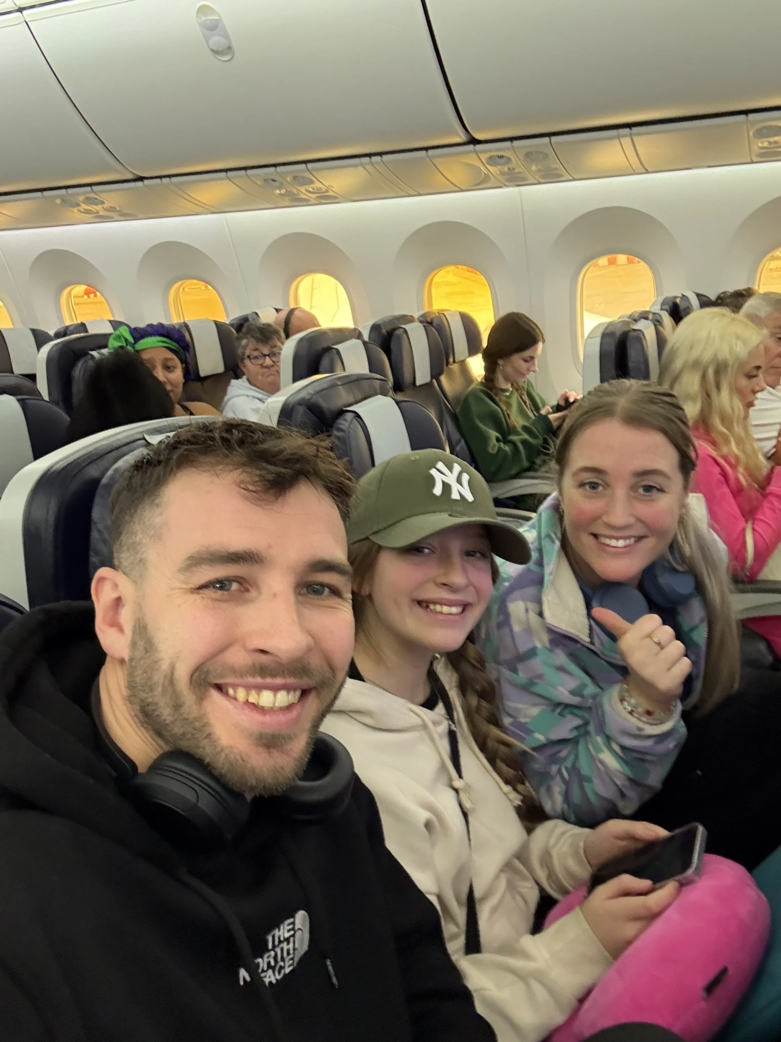 Smiths on tour, a full time travelling family on a plane together setting off to a new destination around the world