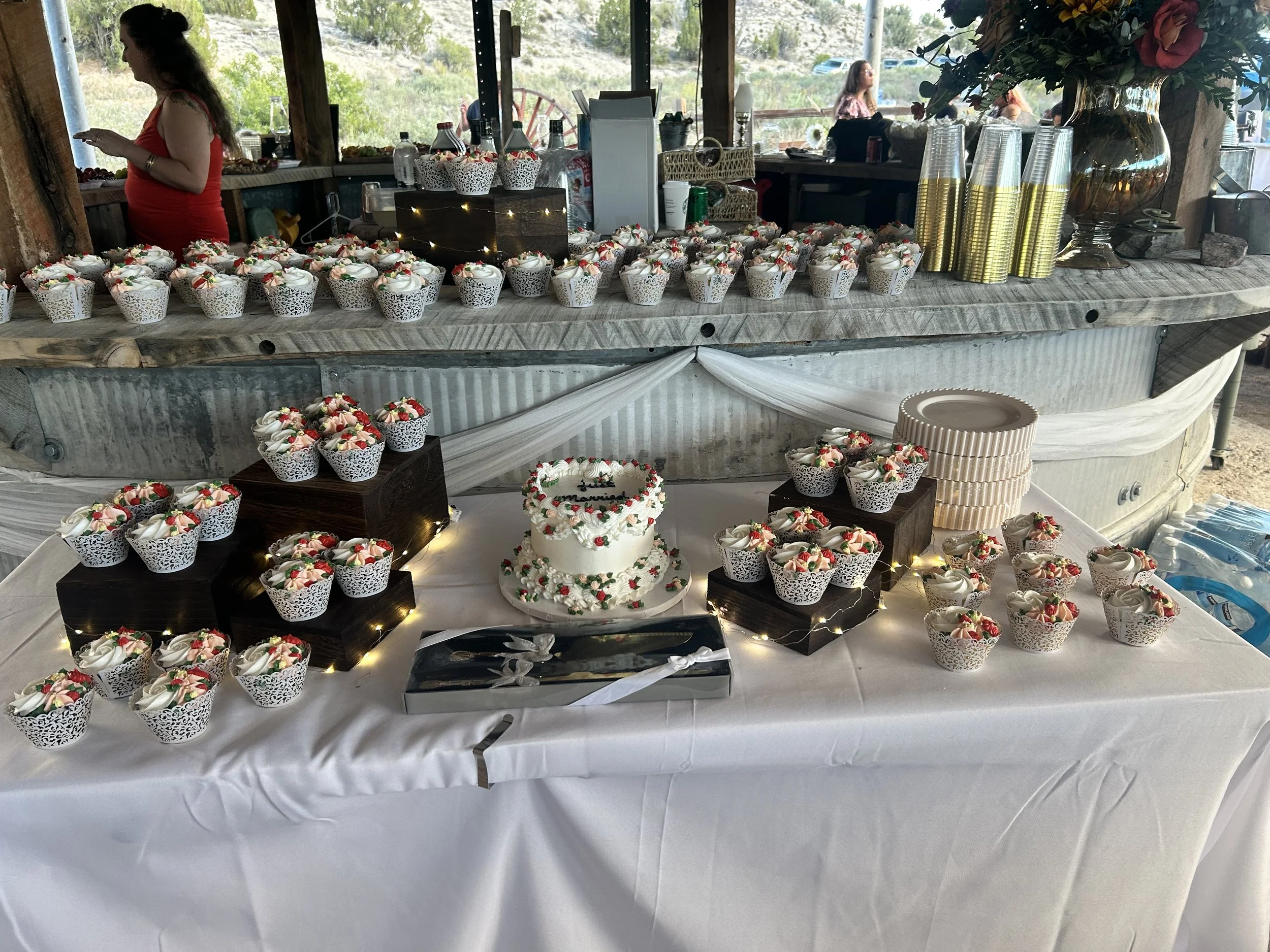 Wedding cake at Lost Pond wedding venue on silo bar under the tented canopy.