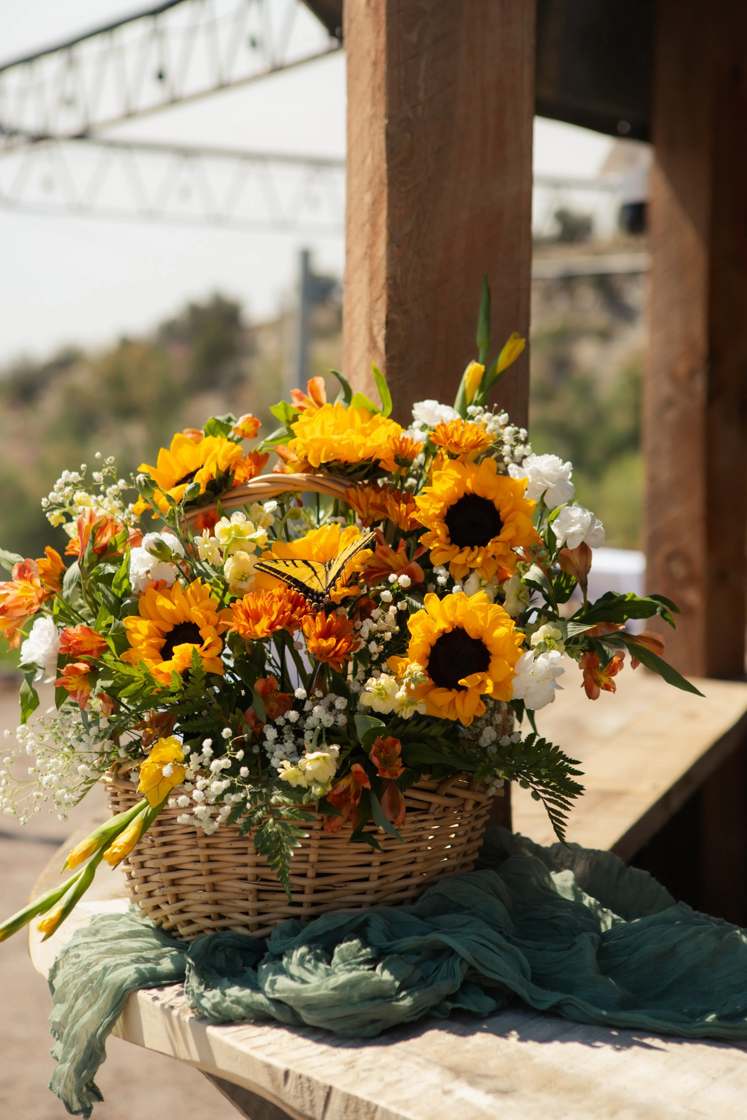 Sunflowers on the 360 degree silo bar at Lost Pond wedding venue, an outdoor wedding venue near Canon City, Pueblo, and Colorado Springs, Colorado.