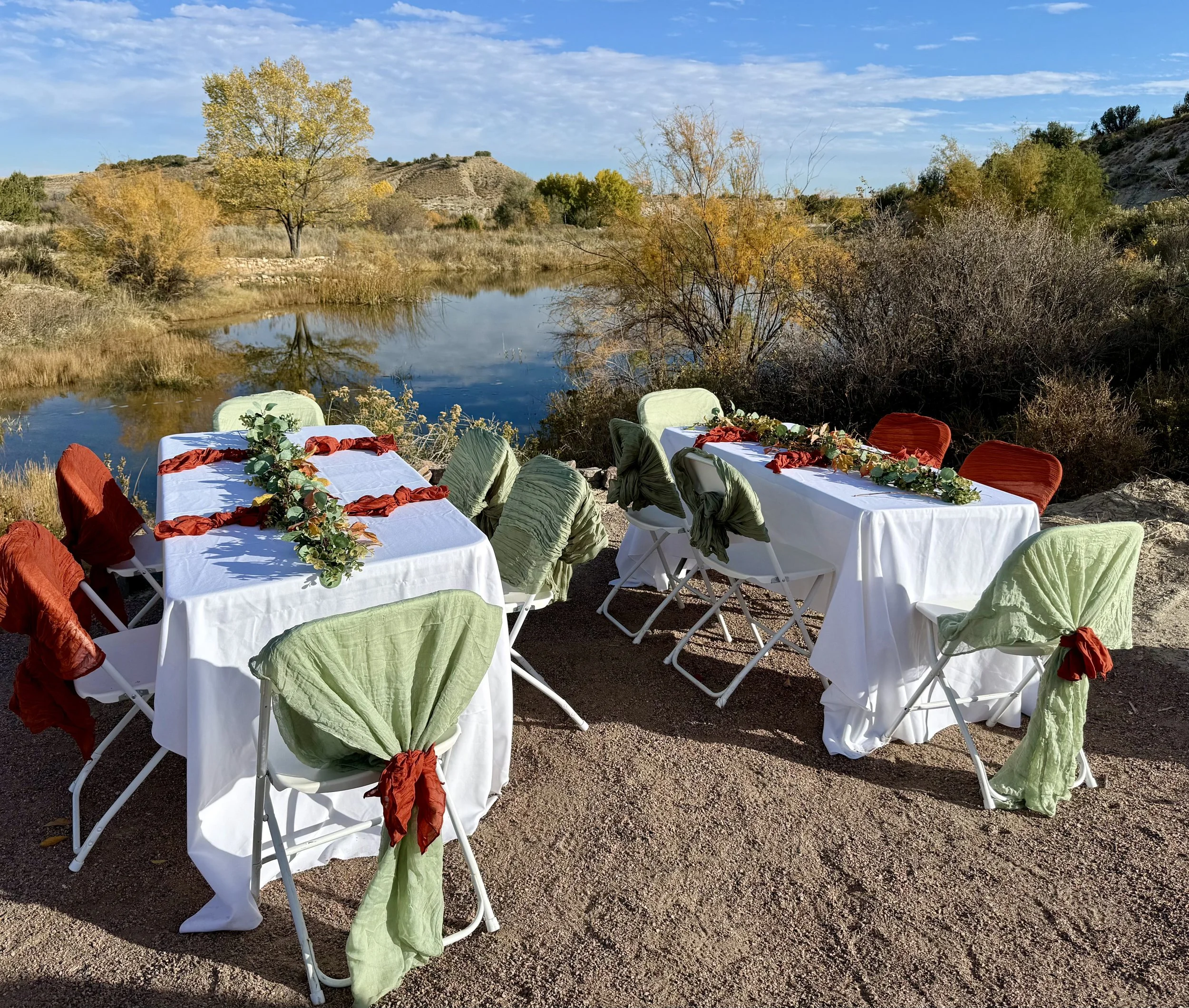 Wedding reception by the pond at secluded, rustic, outdoor wedding venue, Lost Pond near Canon City Colorado.