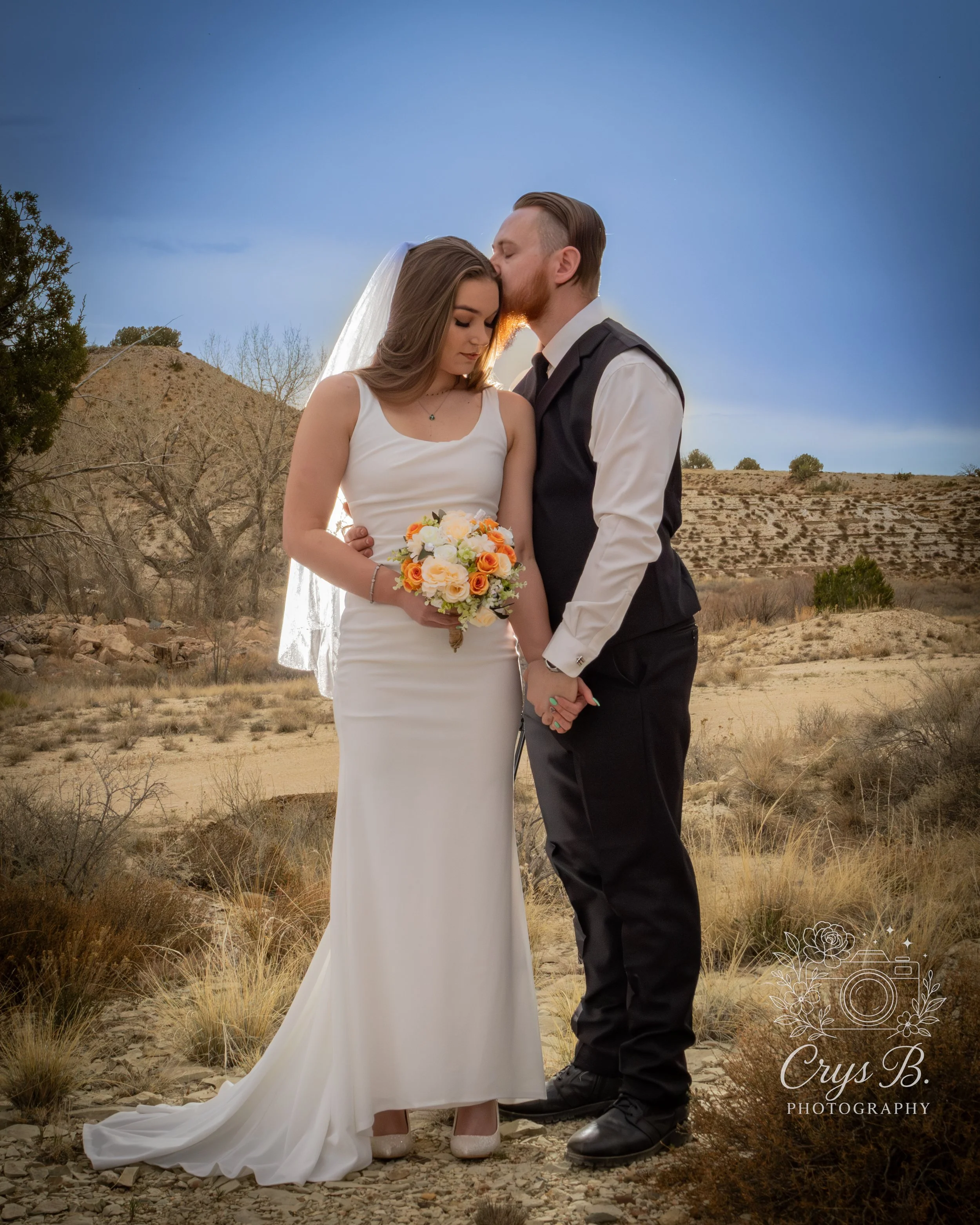 Bride and groom at Lost Pond wedding venue at one of the many photo spots for engaged couples to take pictures on their wedding day and reception near Canon City, Colorado.
