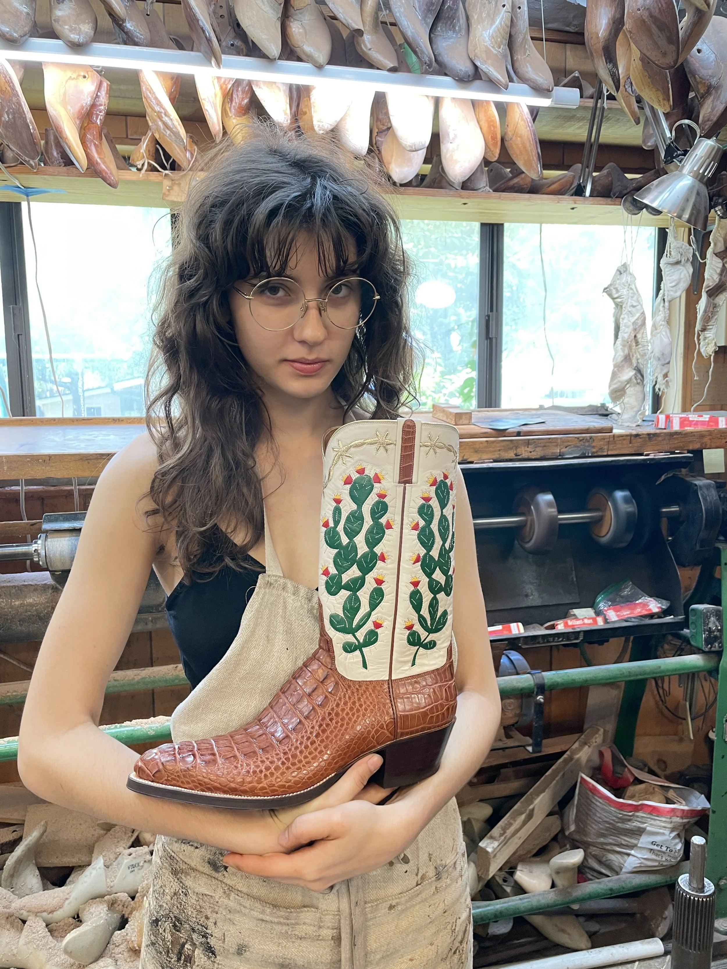 Teya Saadeh (she/her) is a Palestinian/Irish artist based in Austin, Texas. She is a member of Viva Palestina Orchestra and an organizer for ATX Events for Palestine. Teya is currently studying Cowboy Bootmaking at Texas Traditions Boots under Lee Mi