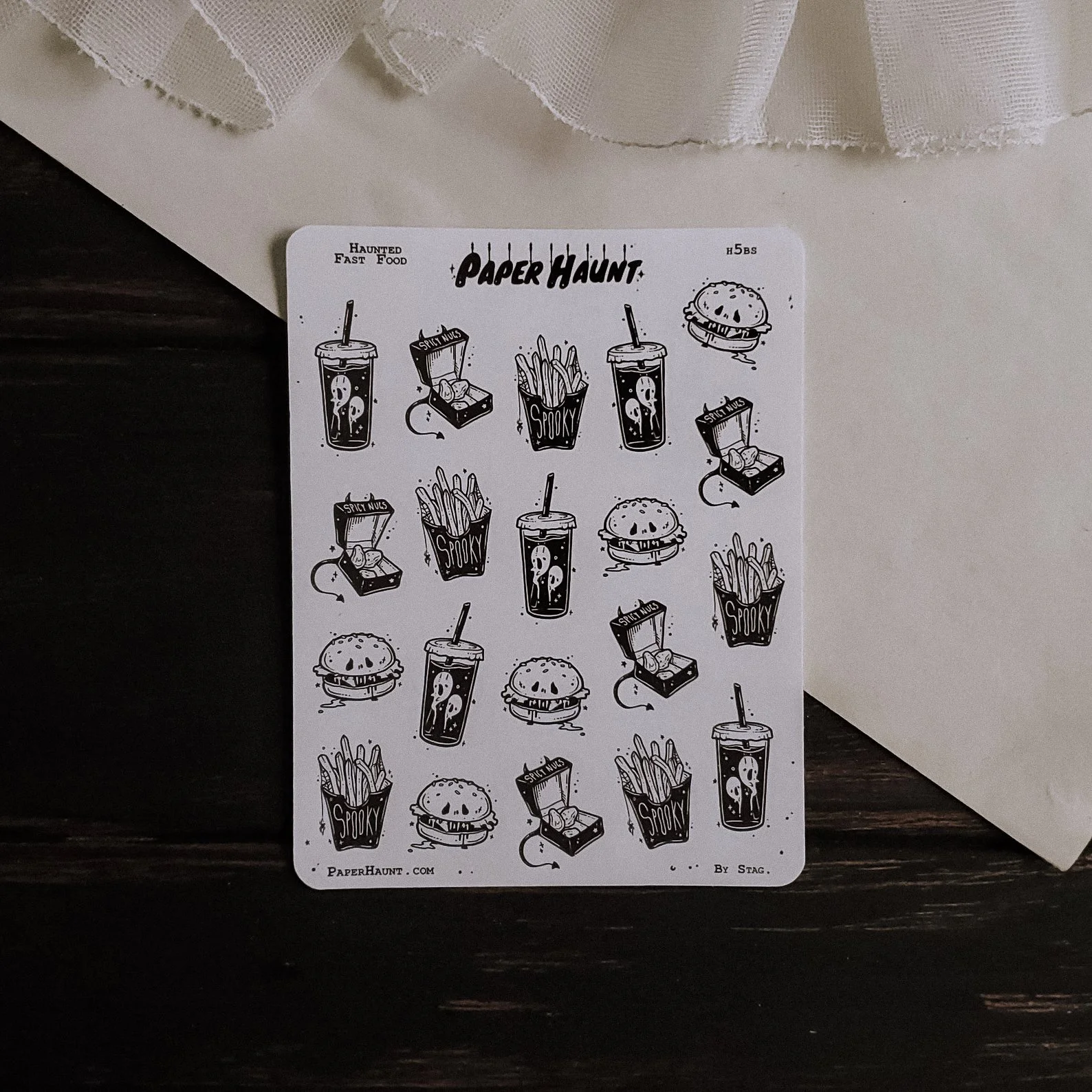 Sticker sheet with spooky fast food characters, blending horror and humor for unique planner decorations.