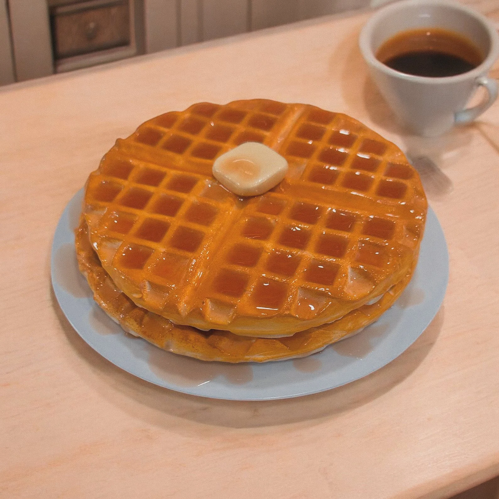 A towering stack of fake waffles with syrup and butter detailperfect for cafe window displays, food photography, or brunch-themed decor.