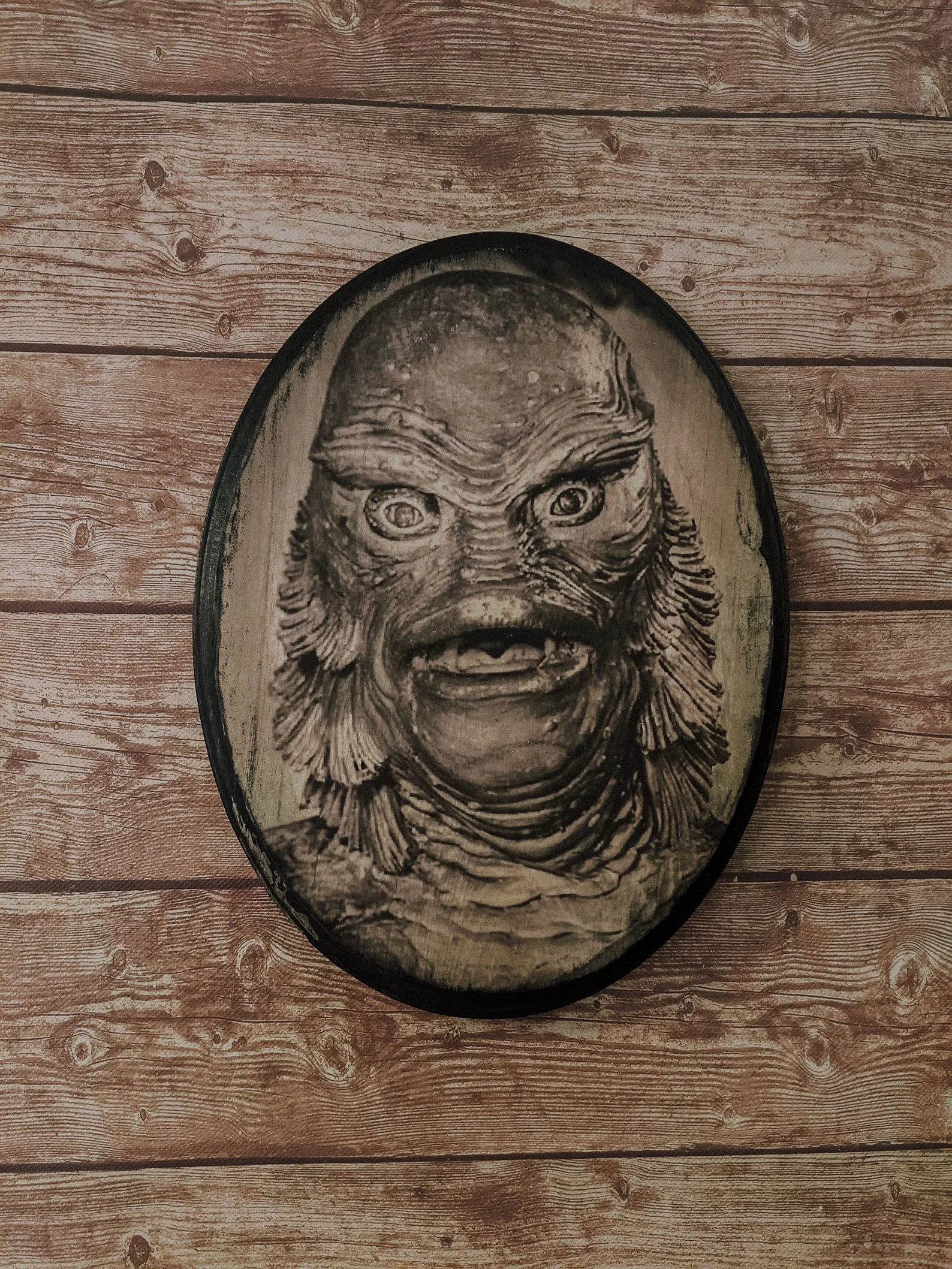 Vintage-style portrait of the Creature from the Black Lagoon in a Victorian outfit, blending classic horror with gothic decor. Ideal for monster movie lovers and haunted gallery wall collectors.