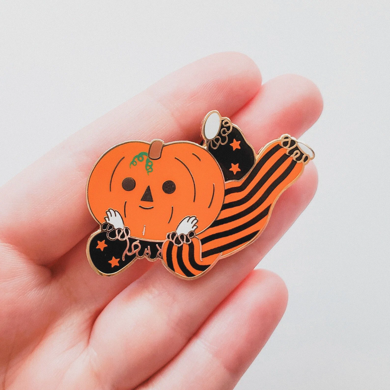 Pumpkin Boi is here to lay down, give up, and look adorable while doing it. This enamel pin features a floppy little jack-o’-lantern who’s clearly had enough, making it the perfect accessory for your jacket, backpack, or lanyard. Ideal for spooky sea