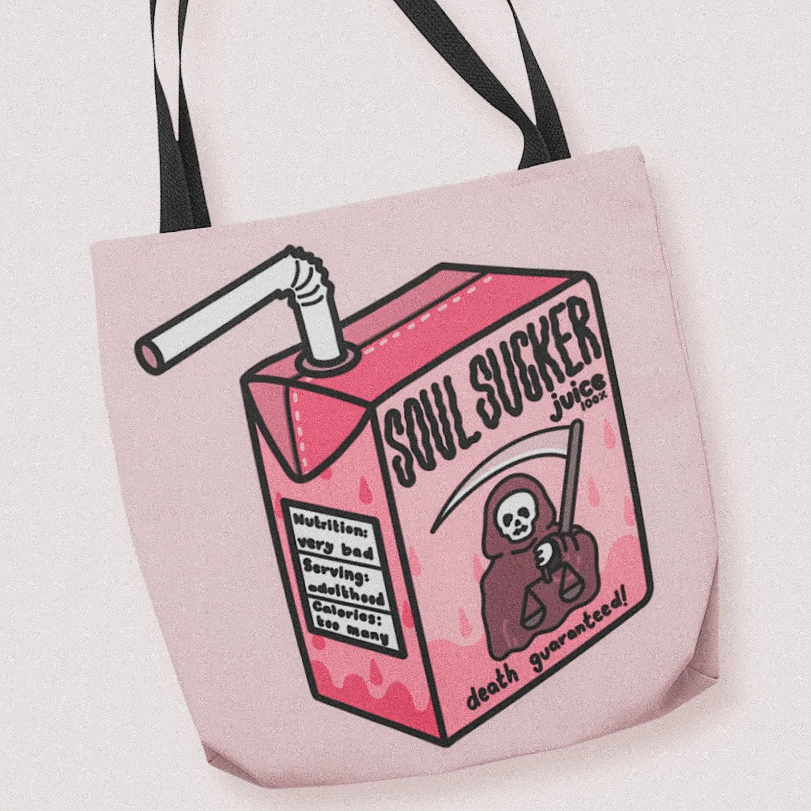 This “Soul Sucker” tote bag is the ultimate accessory for spooky babes running on caffeine, sarcasm, and spooky vibes. Perfect for carrying books, snacks, or the crushed remains of your will to socialize, this funny Halloween tote is lightweight, dur