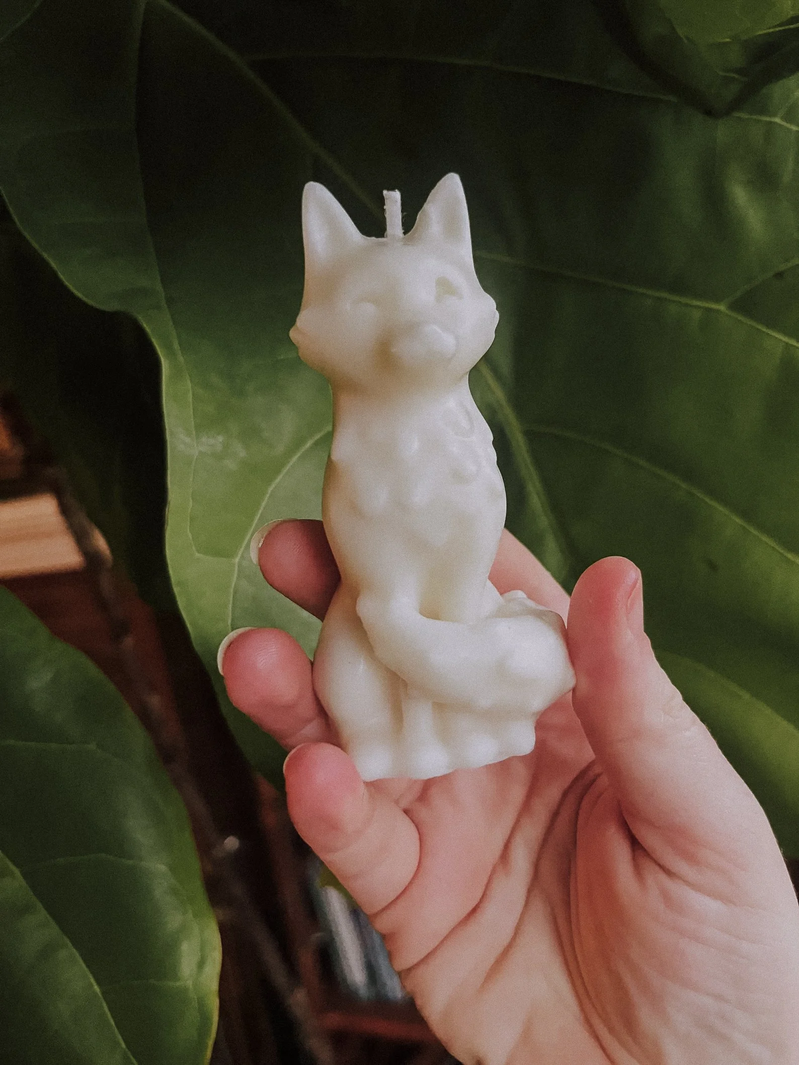 A 4-inch tall fox-shaped candle, hand-poured using a natural soy and beeswax blend. The candle captures the fox’s cunning and graceful essence, with detailed features and a smooth finish. Available in multiple ritual-inspired colors, it’s ideal for s