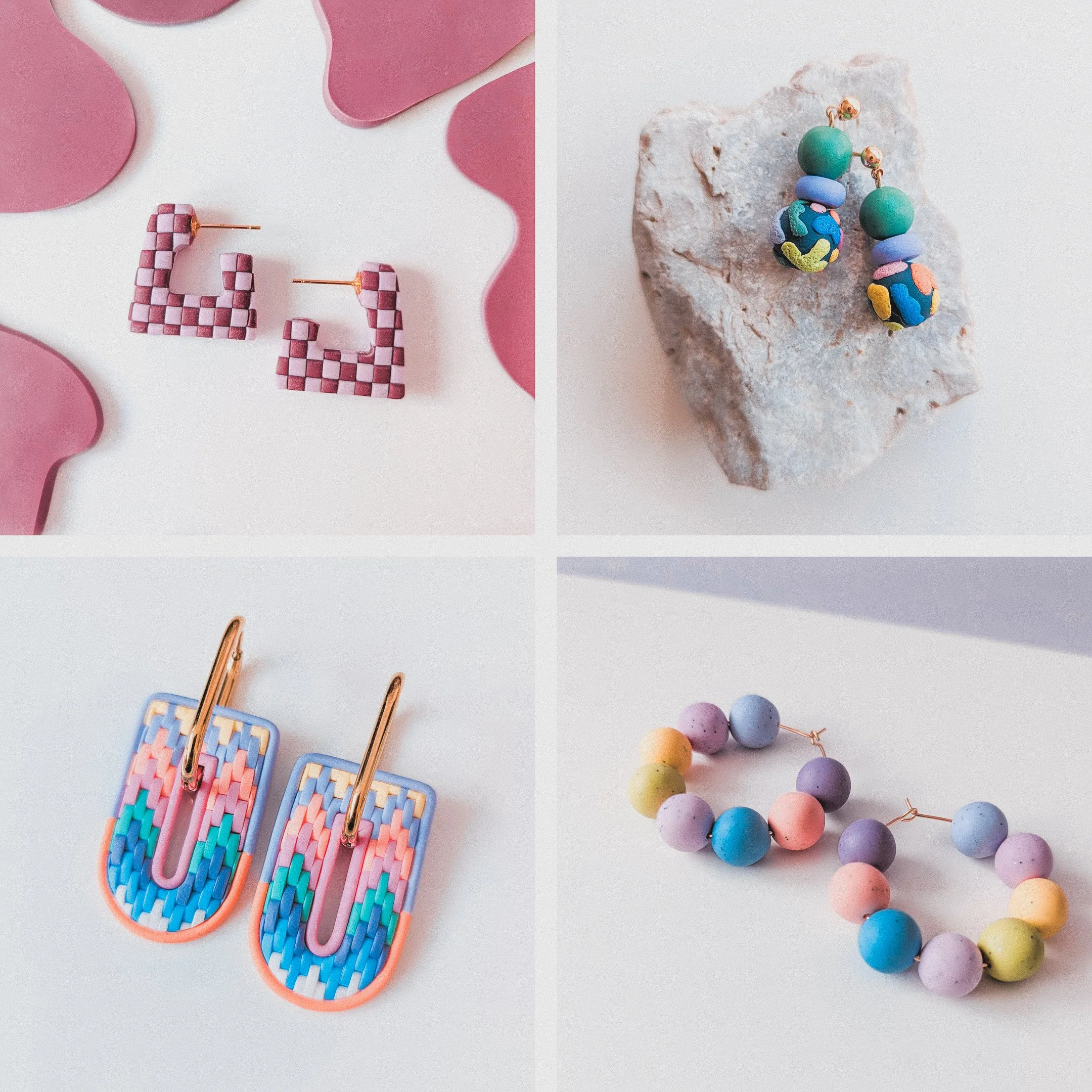 Four different pairs of colorful earrings arranged in a grid on a white background. The top left pair are pink checkered square-shaped earrings. The top right pair are round turquoise and cloth earrings with a floral pattern, displayed on a rock. The bottom left pair are long, rectangular earrings with a rainbow pattern and gold hooks. The bottom right pair are pastel-colored spherical bead earrings in a semi-circle shape.
