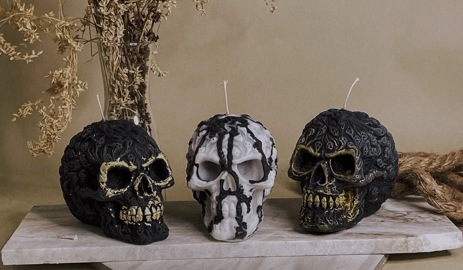 Ghostly white skull-shaped candle perfect for Halloween decor, spooky gifting, or gothic ambiance. A hauntingly beautiful piece for alt home aesthetics and creepy candle lovers.