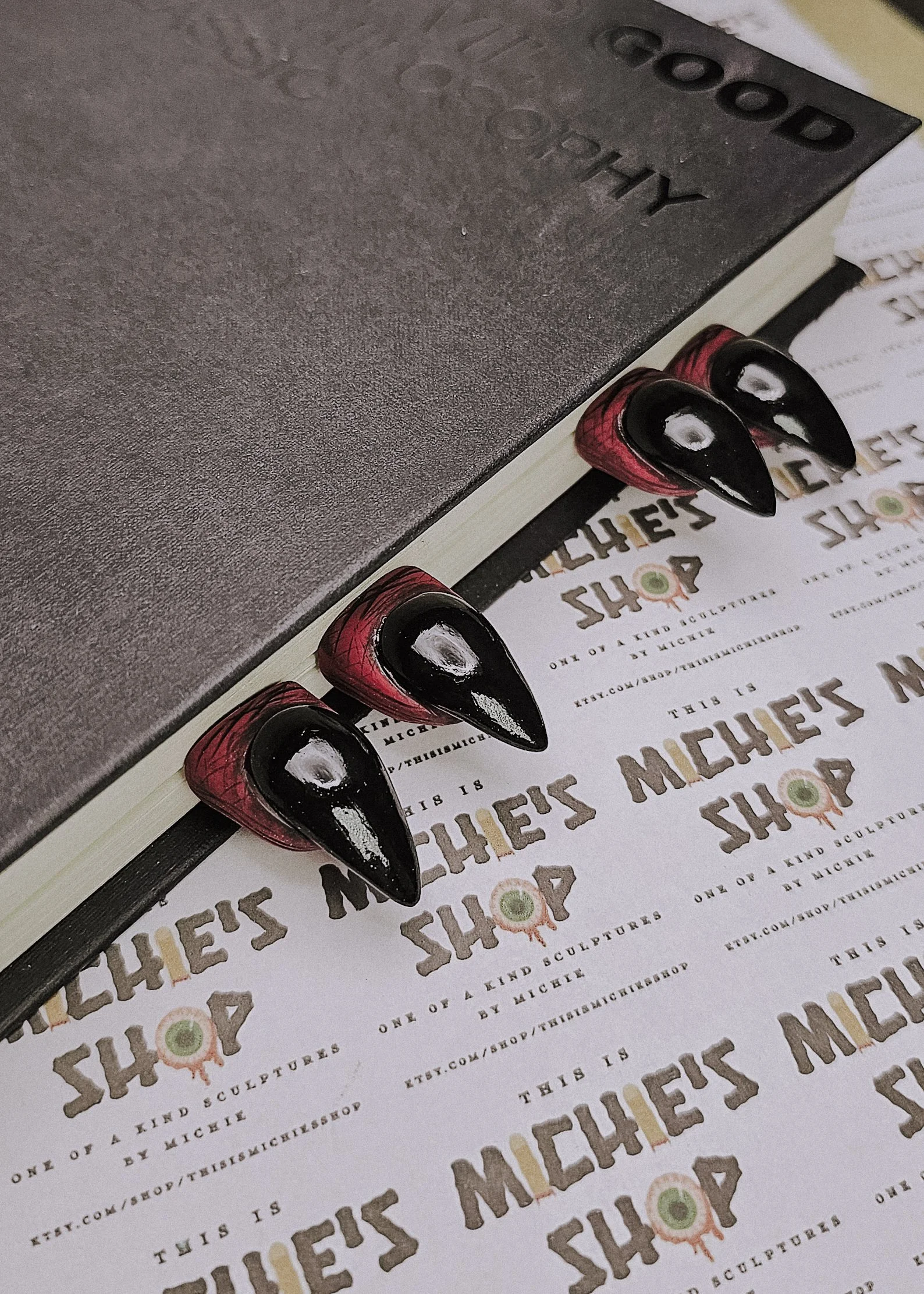 Why have one cursed finger when you can have two? This set of devil-red stiletto finger bookmarks makes a killer gift for readers with dark aesthetics. Handmade, fierce, and freaky in all the right ways.