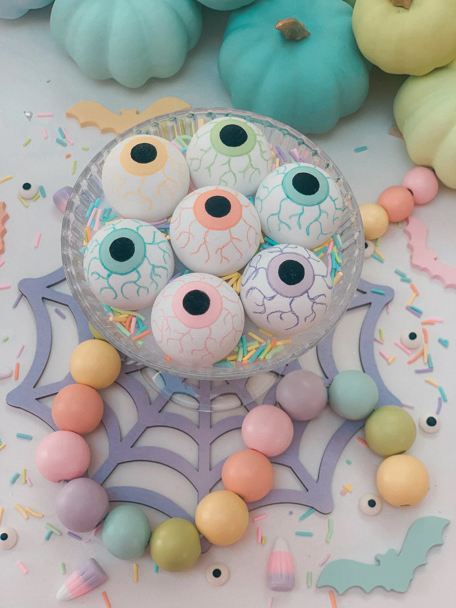 Add a pop of spooky sweetness to your shelf with this pastel wooden eyeball decoration. Hand-painted in mint and pink, this creepy-cute piece is perfect for Halloween vibes or year-round goth whimsy. Whether you’re building an altar, styling your boo