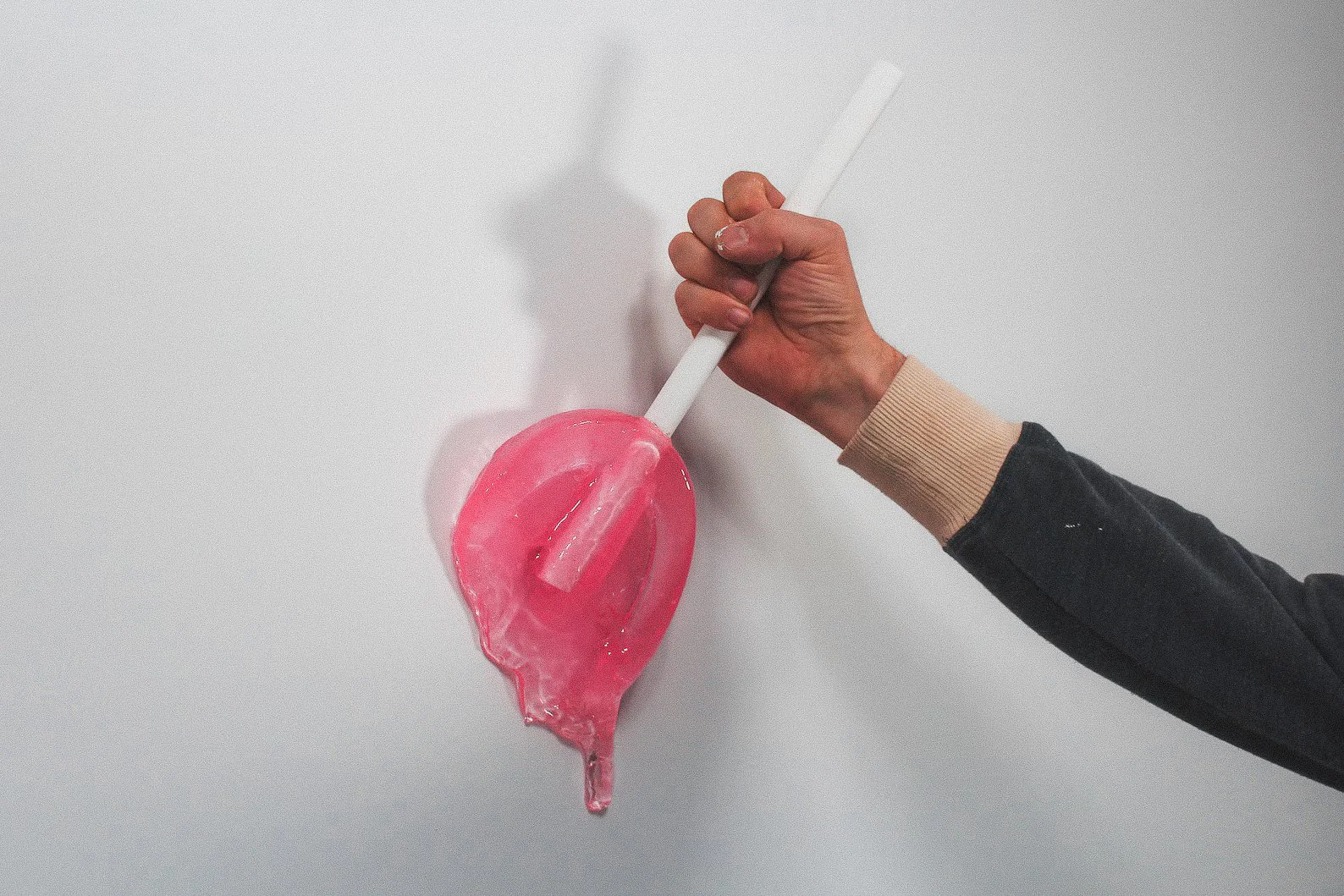 Giant melting resin lollipop in bright swirled colors, perfect for candy-themed rooms, maximalist spaces, or fun wall installations.