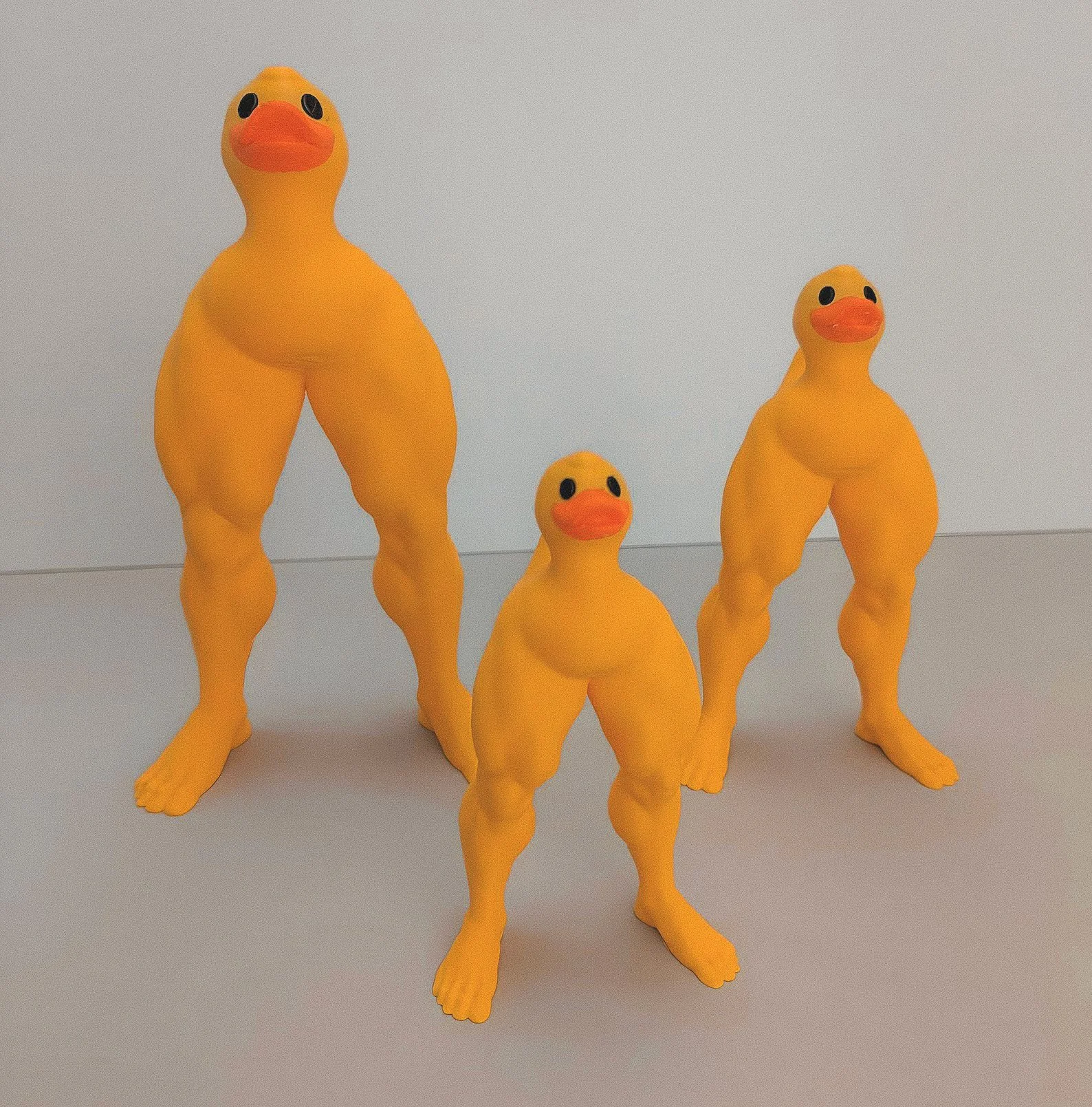 Hilarious duck figurine with ripped bodybuilder legs and a smug face, perfect for meme lovers, gym rats, or unhinged shelf energy.