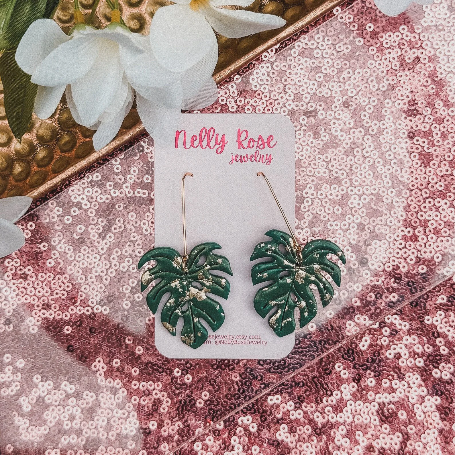 Green monstera leaf earrings crafted from polymer clay, perfect for plant moms, earthy style lovers, and tropical fashion vibes.