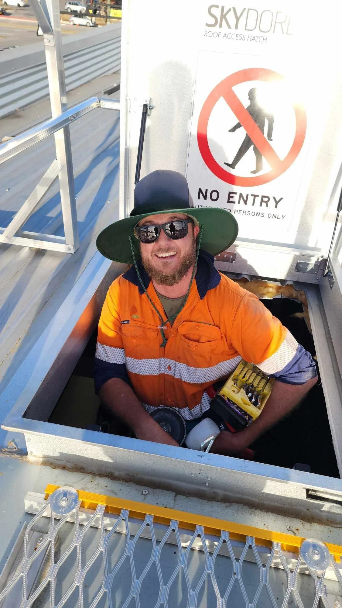 ESMG team member in high-visibility workwear on site in Western Australia.