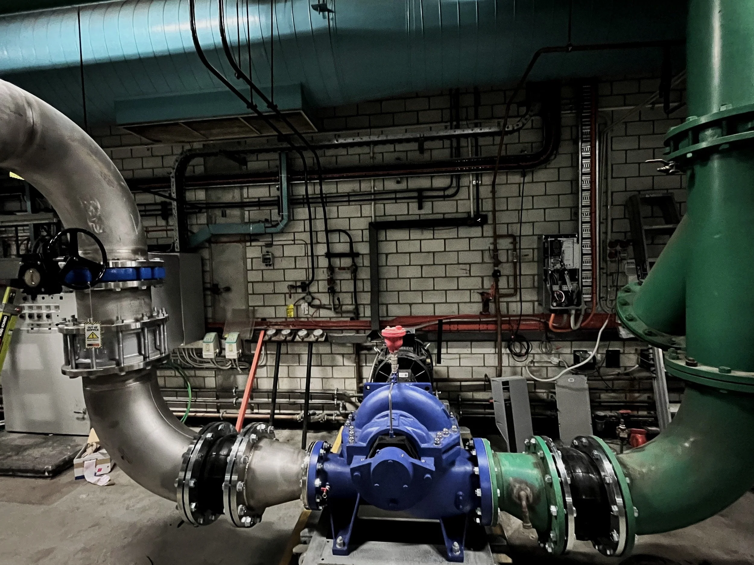 Industrial pump room with mechanical piping at a facility in Western Australia.