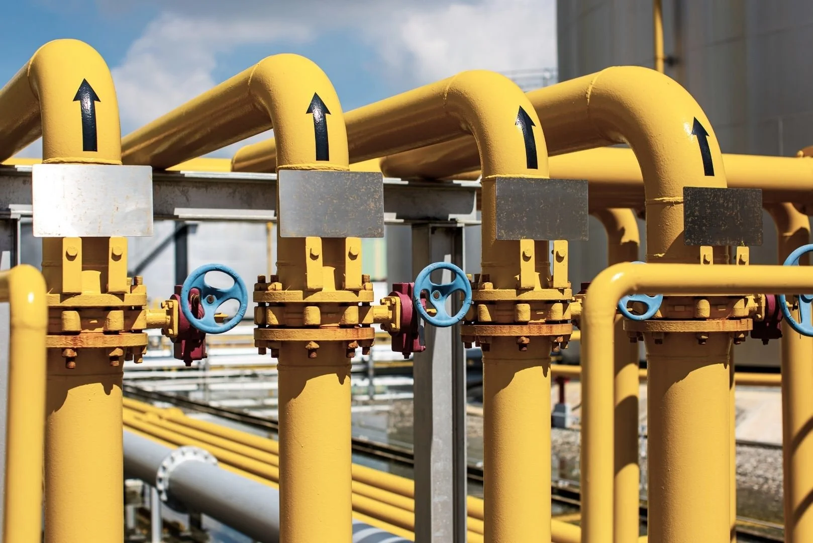 Yellow industrial water pipes at a commercial facility in Western Australia.