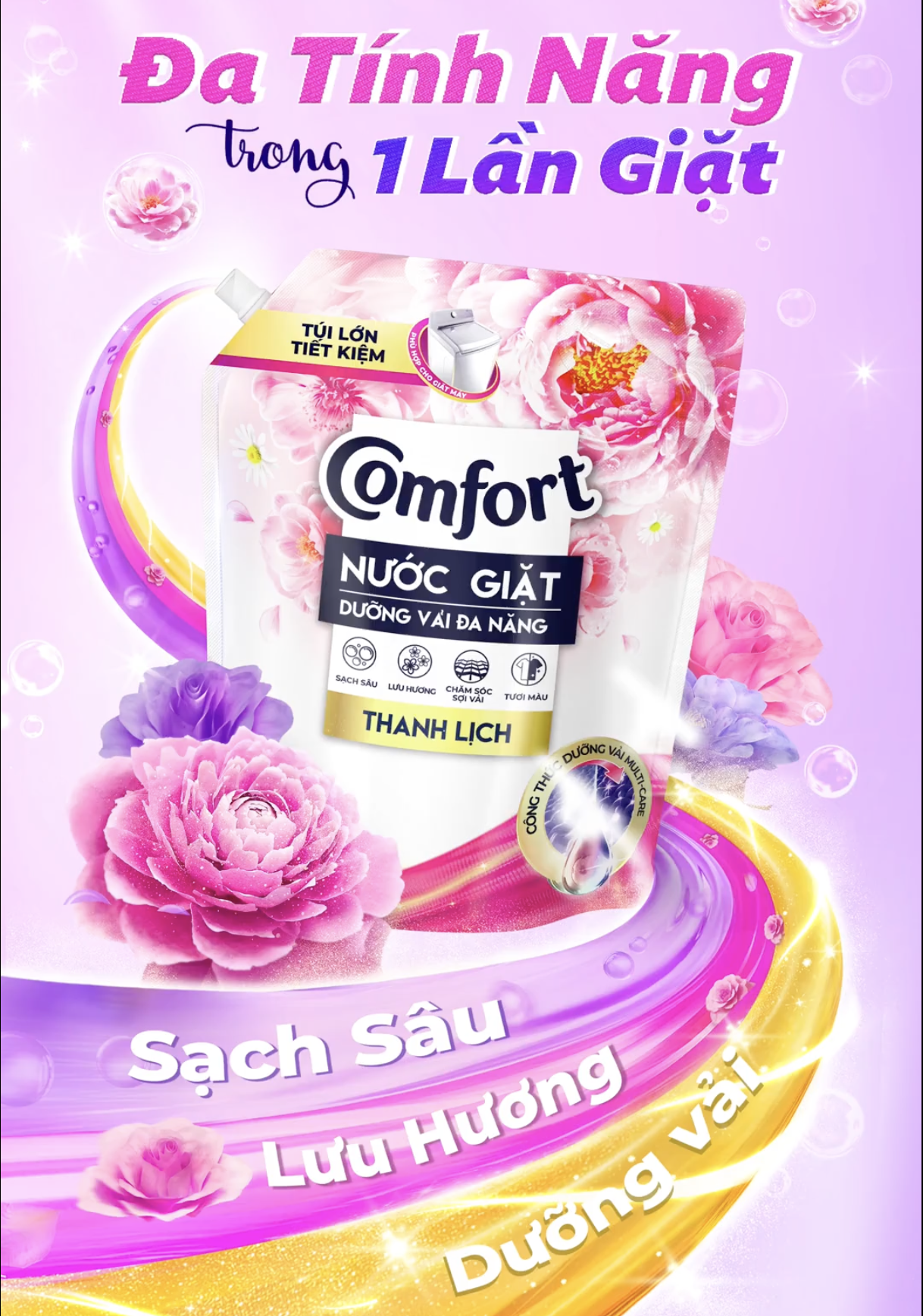 Advertisement for Comfort lavender scented fabric softener, featuring pink and purple flowers, colorful swirling ribbons, and text in Vietnamese promoting deep cleaning, fragrant scent, and long-lasting freshness.