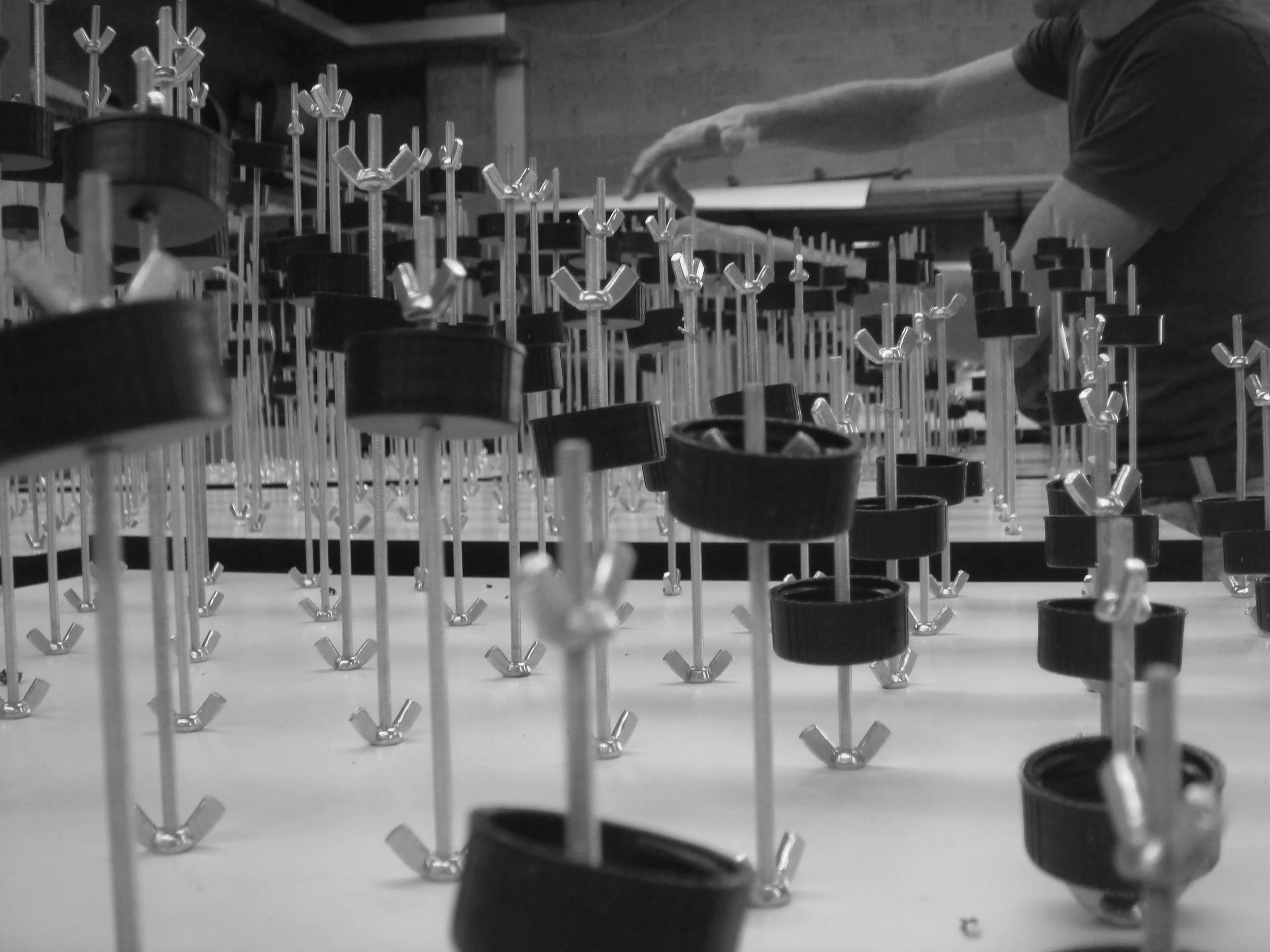 021_securing bottle caps to rod copy.jpg