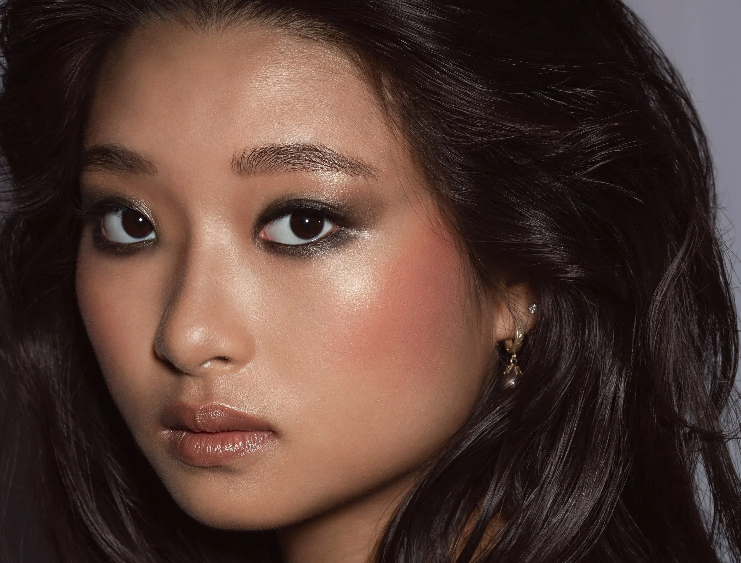 Smokey eye makeup and hair photoshoot on asian woman