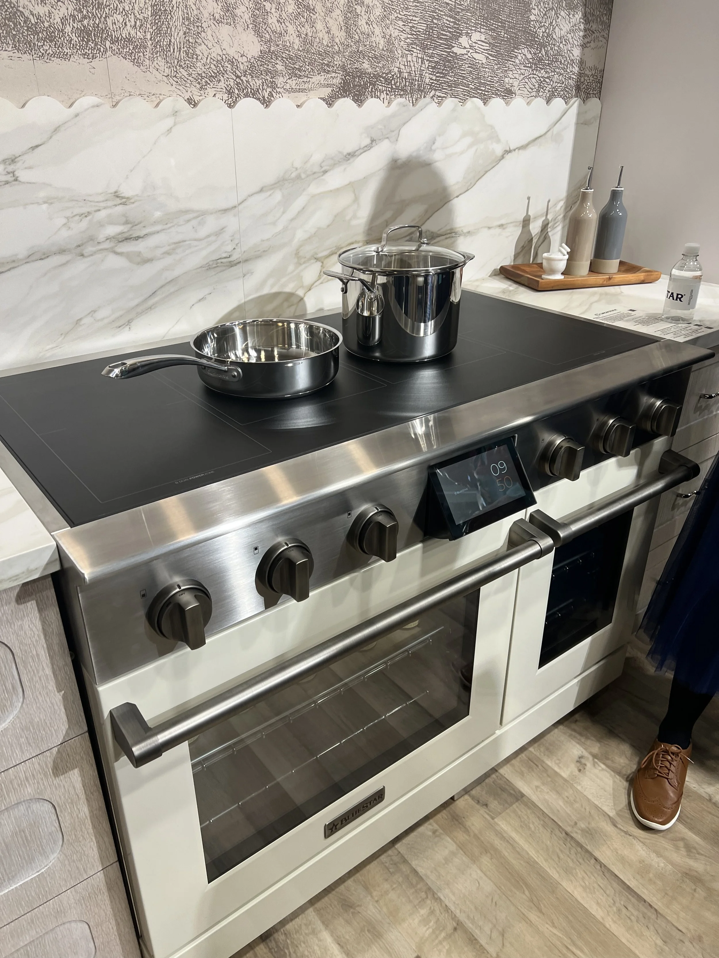 BlueStar 48-inch Platinum induction range in ivory with a matte black cooktop