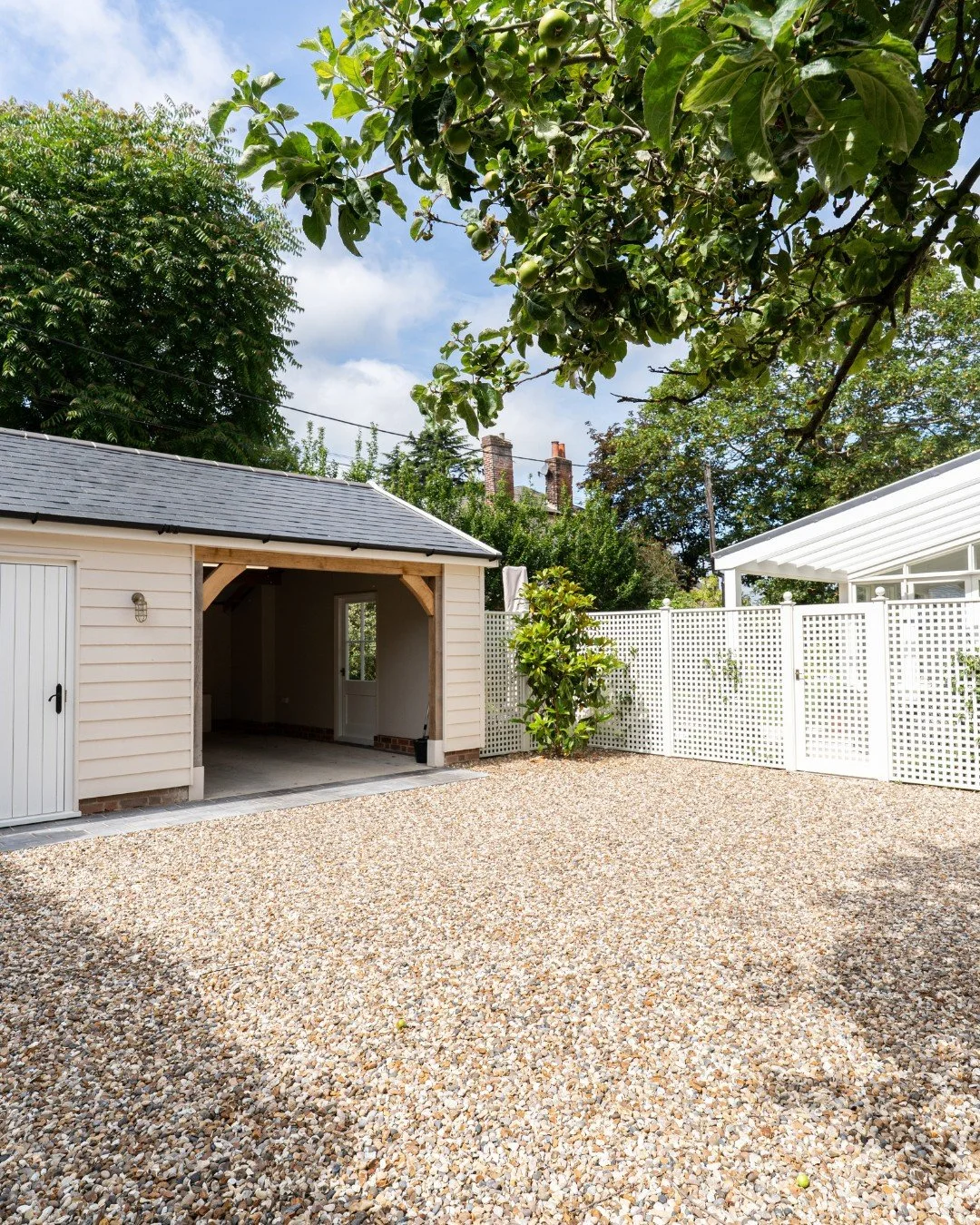 What was once an overgrown entrance hidden behind years of neglect is now a smart, practical arrival that does justice to Dorset House.

The original brick archway has been carefully restored and now frames a new driveway and bespoke car port that fe