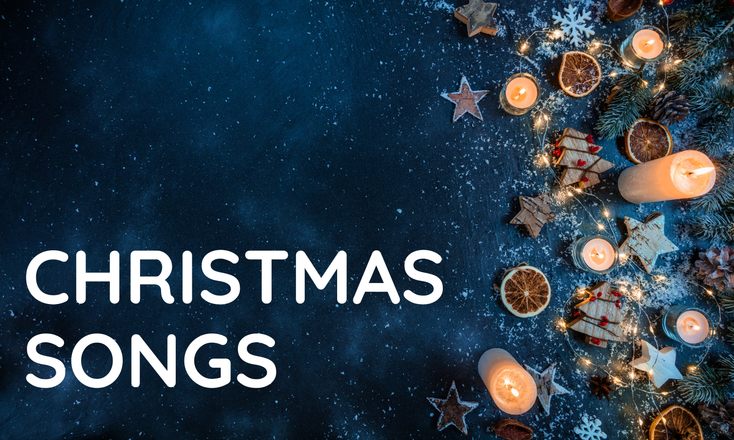 Decorative Christmas scene with candles, dried orange slices, wooden stars, Christmas trees, pinecones, and ornaments on a dark surface.