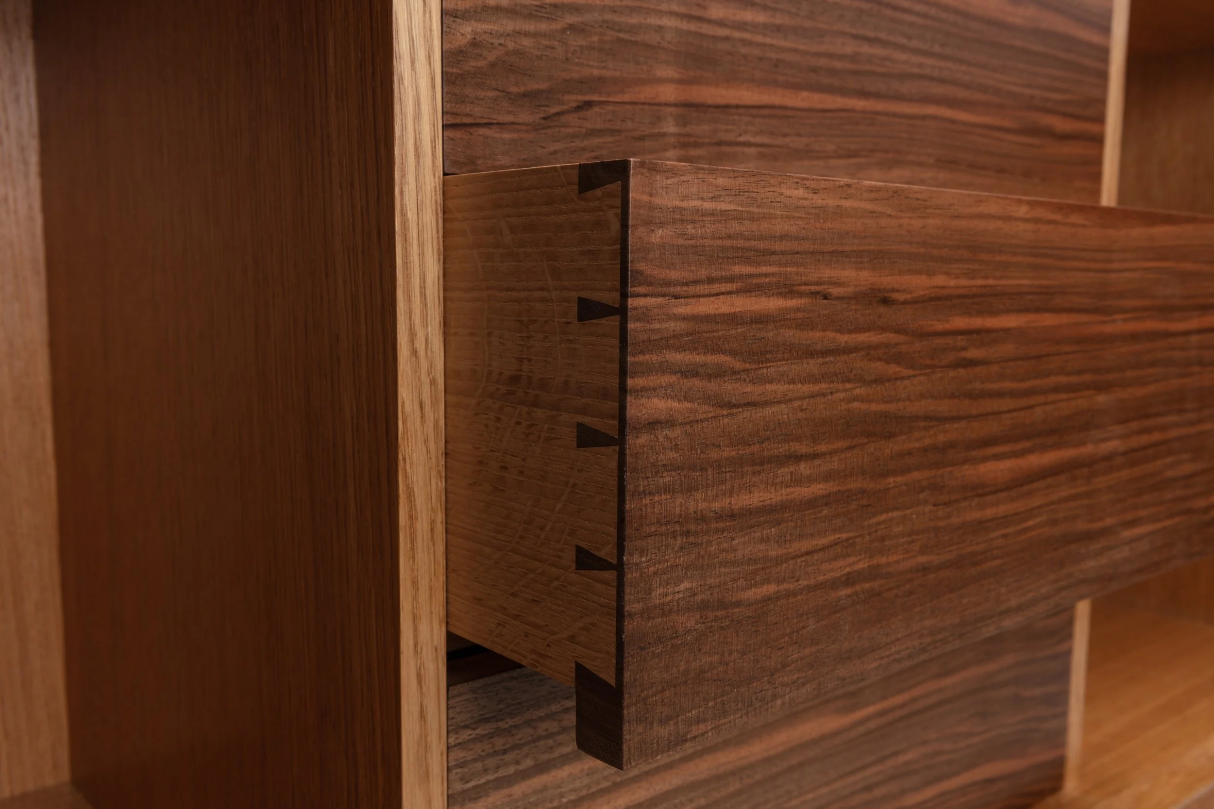 Oak end grain doors, brass door handle, and English walnut drawer fronts, Handmade oak sideboard. Hand cut dovetails.
