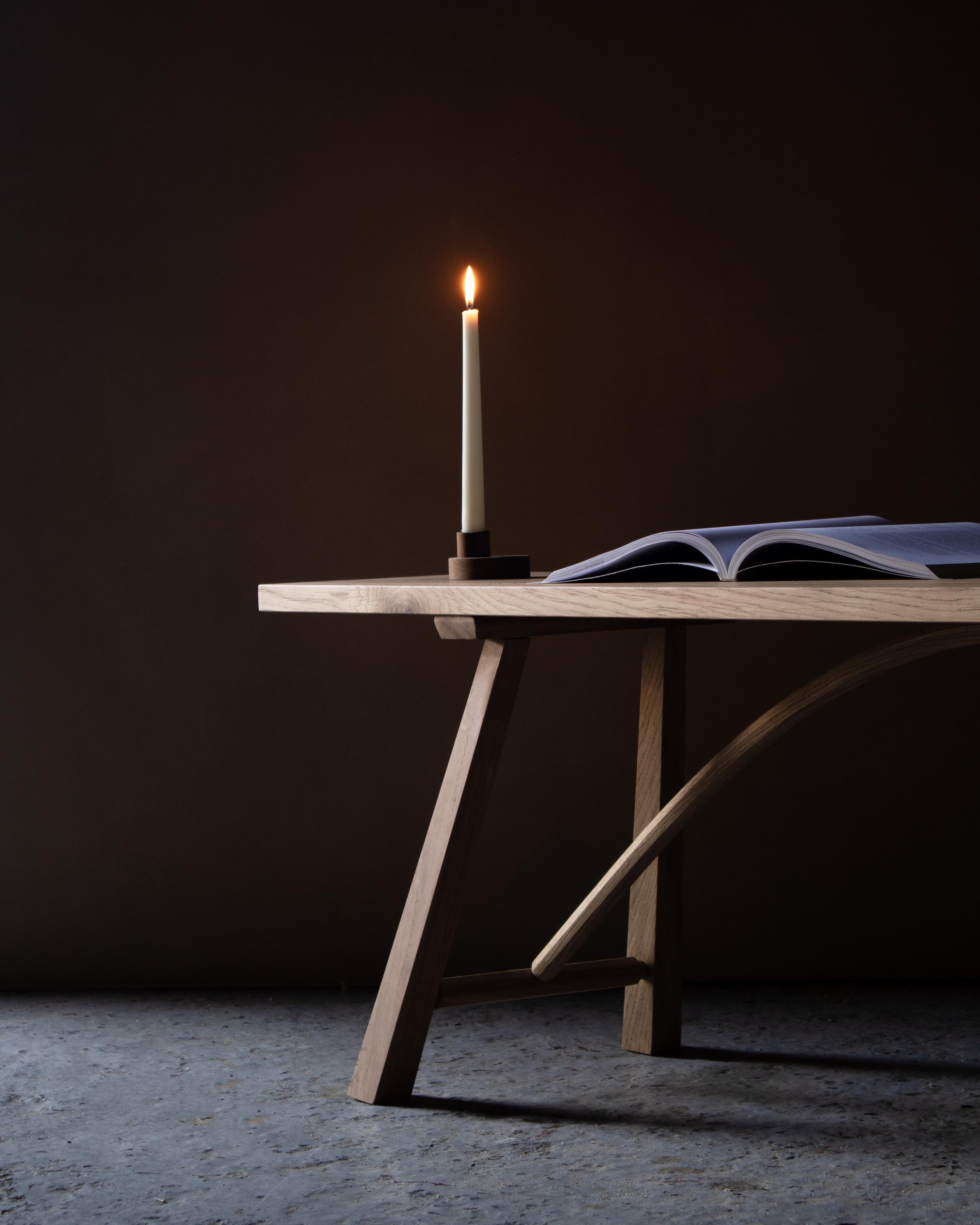 Handcrafted Le Coubre bench made from locally sourced British oak with traditional farmhouse design and curved rail detail