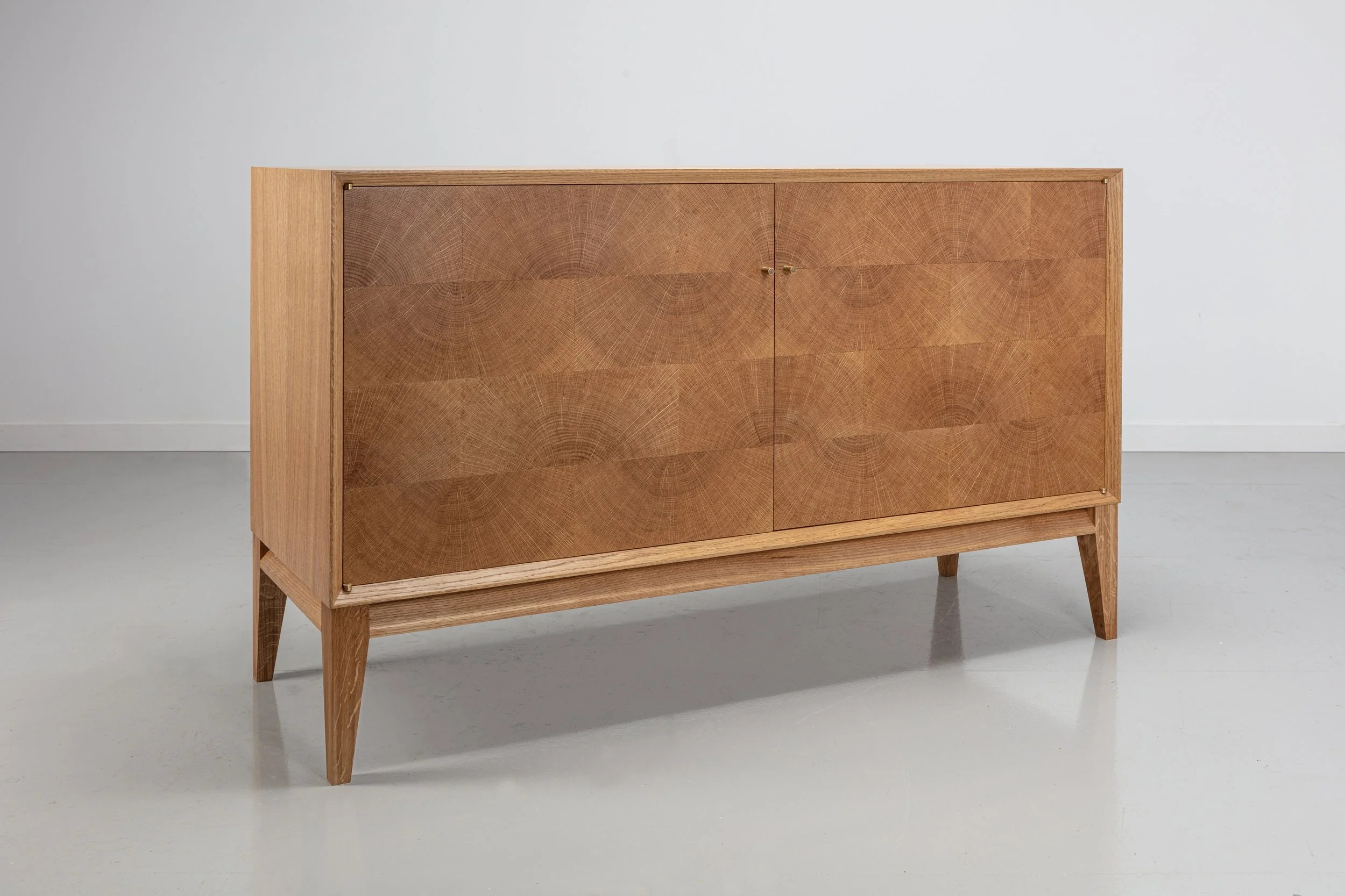 Oak end grain doors, brass door handle, and English walnut drawer fronts, Handmade oak sideboard. 