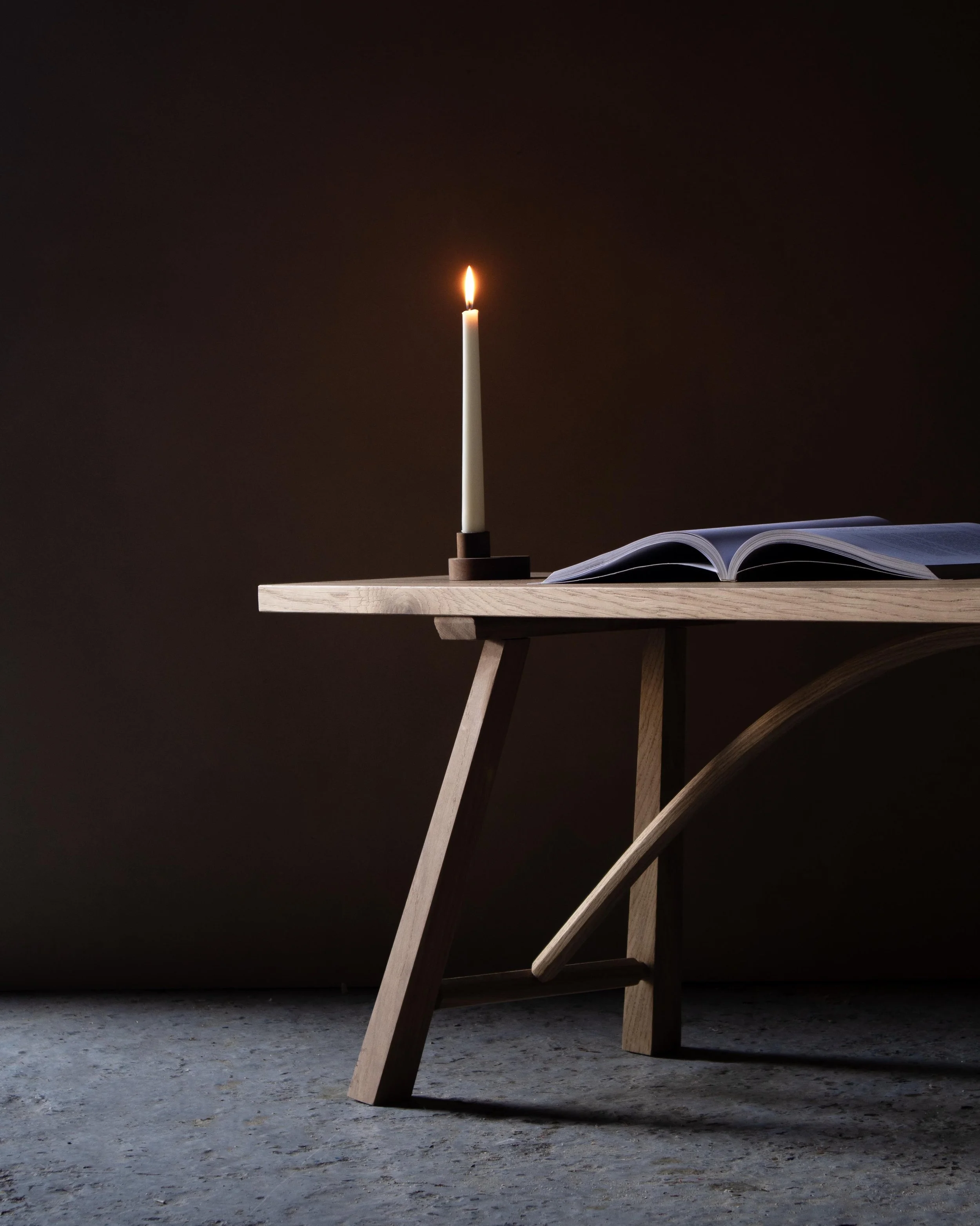 Handcrafted Le Coubre bench made from locally sourced British oak with traditional farmhouse design and curved rail detail