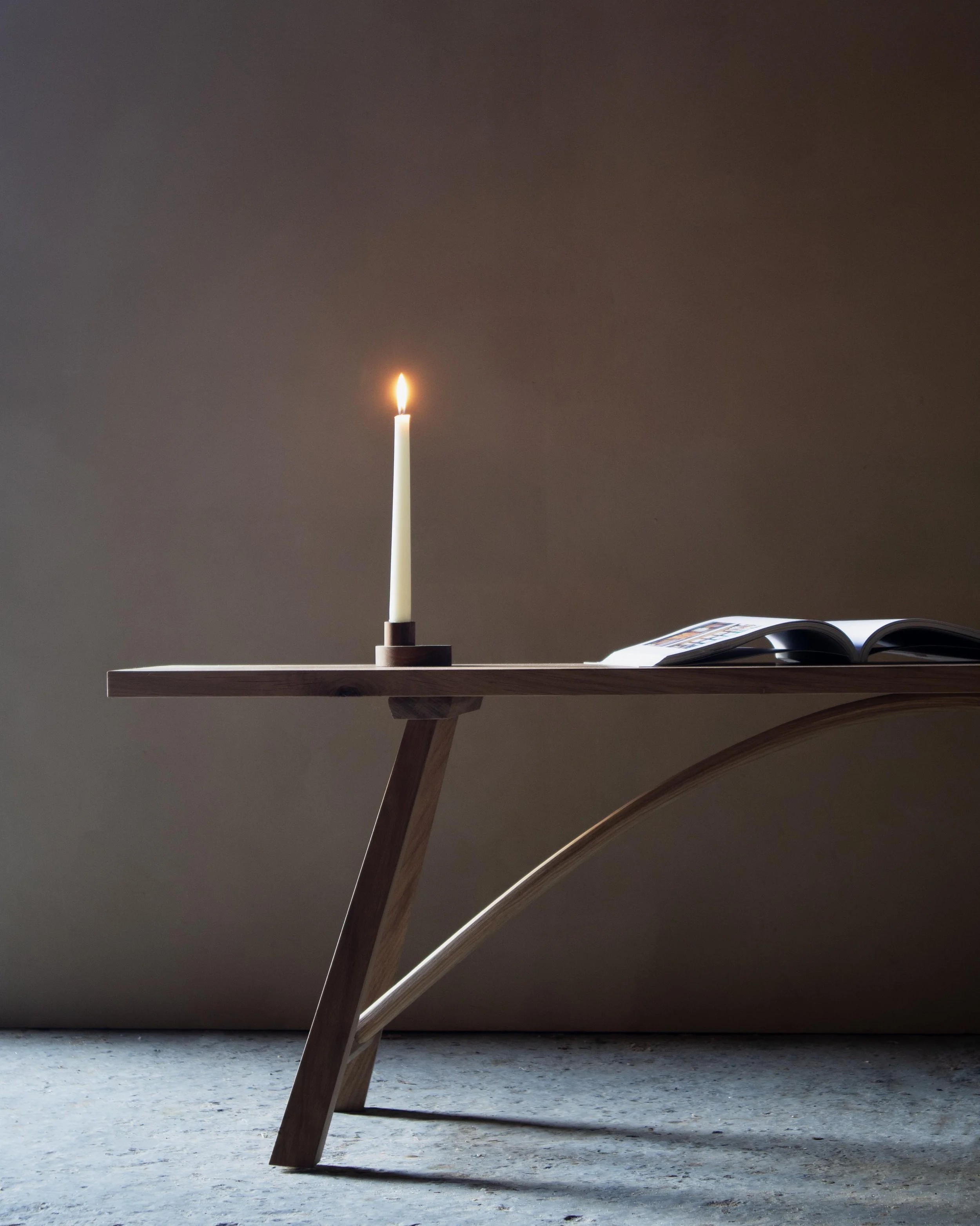 Handcrafted Le Coubre bench made from locally sourced British oak with traditional farmhouse design and curved rail detail